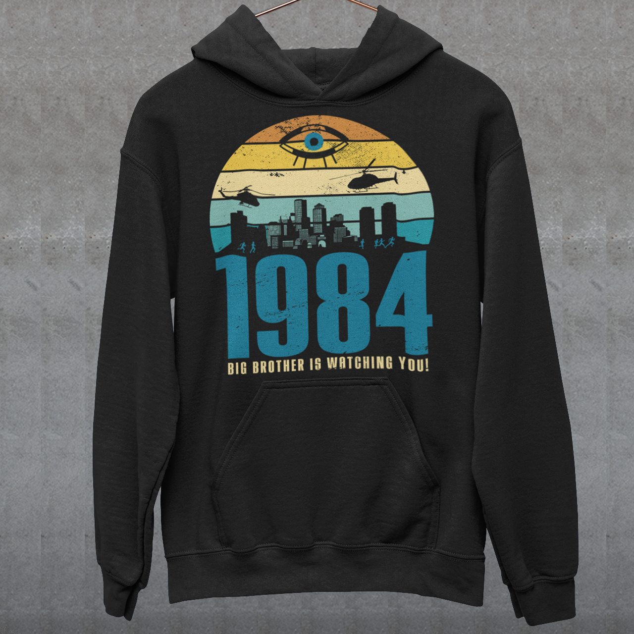Introducing our George Orwell 1984 Hoodie with a bold "Big Brother is Watching" design! If you're a fan of Orwell's classic dystopian novel or just love thought-provoking literary references, this shirt is for you. The design features the iconic phrase "Big Brother is Watching" in small, bold letters, set against a stark sunset background. The lettering has a slightly distressed, vintage look, giving the shirt a cool, edgy vibe.