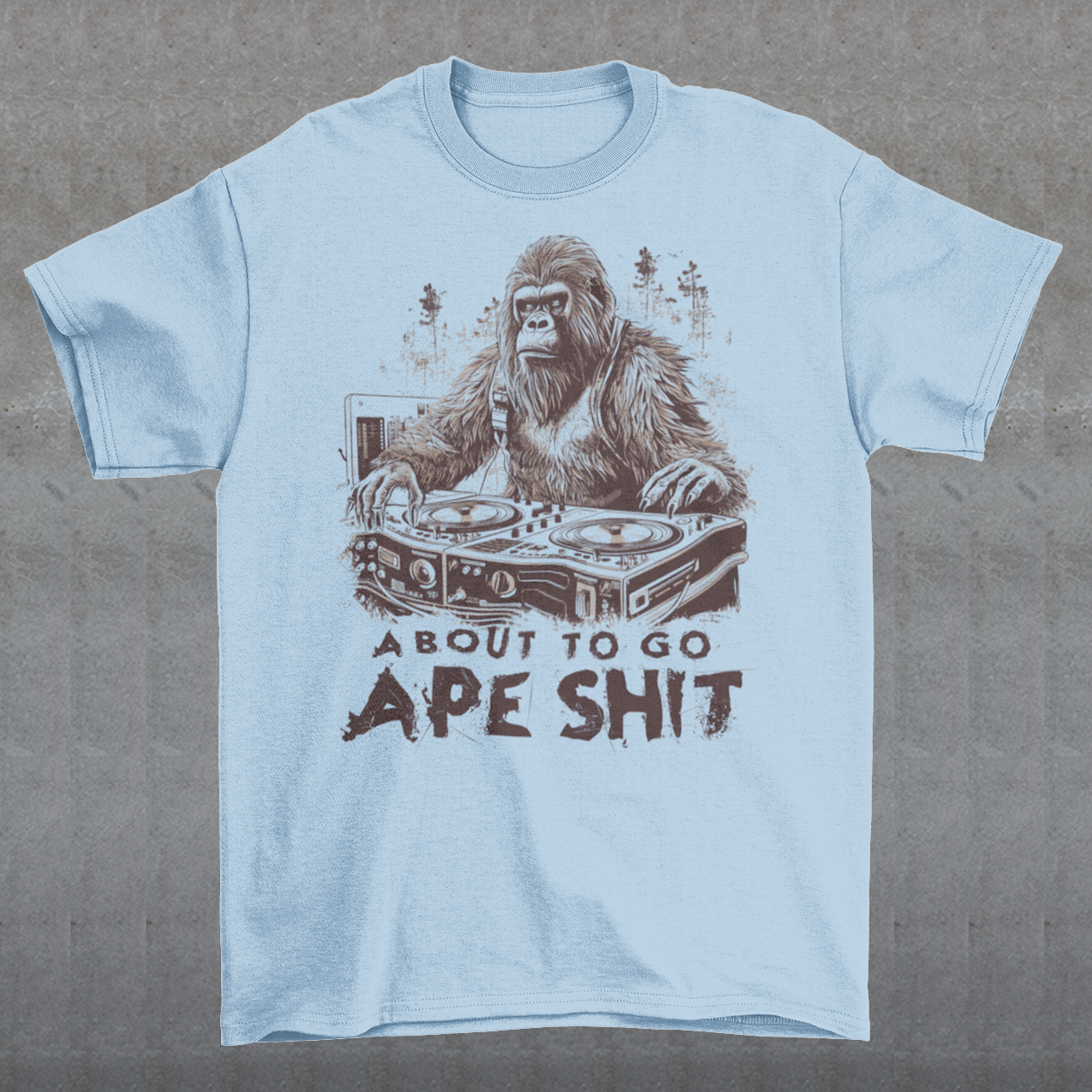 This t-shirt features a bold and eye-catching design of a gorilla playing turntables, surrounded by trees. The gorilla's intense expression and skilled DJing skills convey a sense of energy and excitement. The text "ABOUT TO GO Ape Shit" adds to the playful and humorous tone of the shirt, hinting at the wild and uninhibited fun that the wearer is ready to unleash. This phrase, combined with the gorilla DJ graphic, makes for a unique and memorable design that is sure to stand out in any crowd.