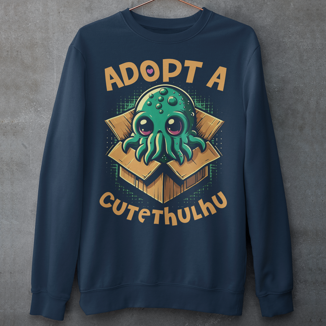 Embrace the whimsy of the cosmic with our "Adopt a Cutethulhu" Sweatshirt! Featuring an adorable depiction of Cthulhu, this charming design reimagines the ancient cosmic entity in the most delightful way possible. Nestled snugly in a cozy cardboard box, our little Cutethulhu waits patiently with big, endearing eyes that are impossible to resist. Whether you're a Lovecraft enthusiast or just a fan of cute and quirky designs, the "Adopt a Cutethulhu" Sweatshirt is the perfect blend of myth and adorableness.
