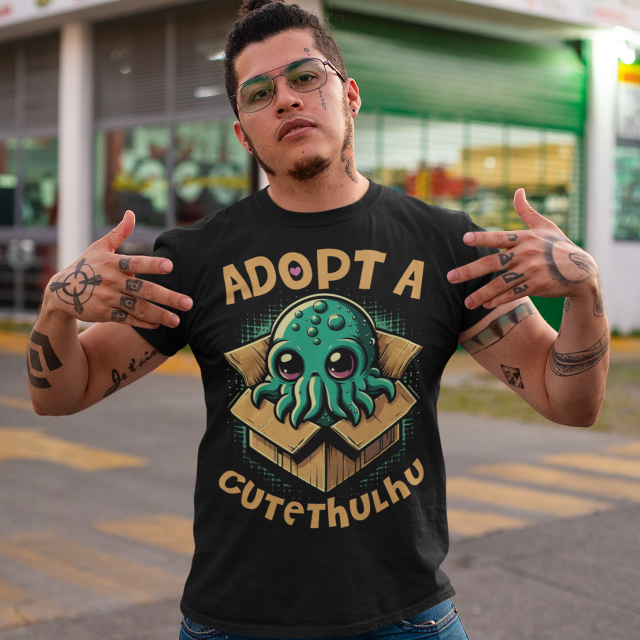 Embrace the whimsy of the cosmic with our "Adopt a Cutethulhu" T-shirt! Featuring an adorable depiction of Cthulhu, this charming design reimagines the ancient cosmic entity in the most delightful way possible. Nestled snugly in a cozy cardboard box, our little Cutethulhu waits patiently with big, endearing eyes that are impossible to resist. Whether you're a Lovecraft enthusiast or just a fan of cute and quirky designs, the "Adopt a Cutethulhu" T-shirt is the perfect blend of myth and adorableness.