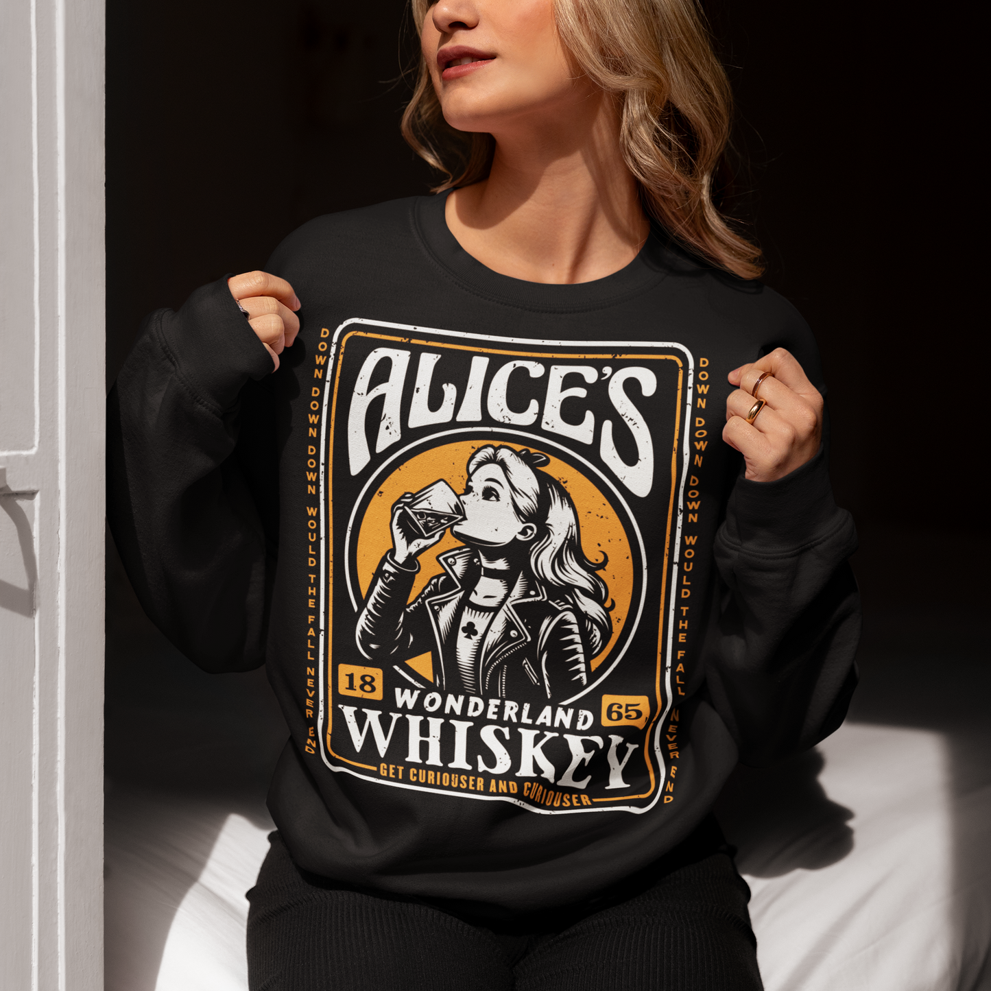 Introducing our enchanting sweatshirt that seamlessly blends the world of whiskey with the whimsy of Alice's Wonderland. This extraordinary design features a captivating whiskey-style label in the center, adorned with intricate details and an irresistible charm. In the heart of the label, you'll find Alice drinking a glass of whiskey, reminiscent of the magical elixir from Alice's adventures.