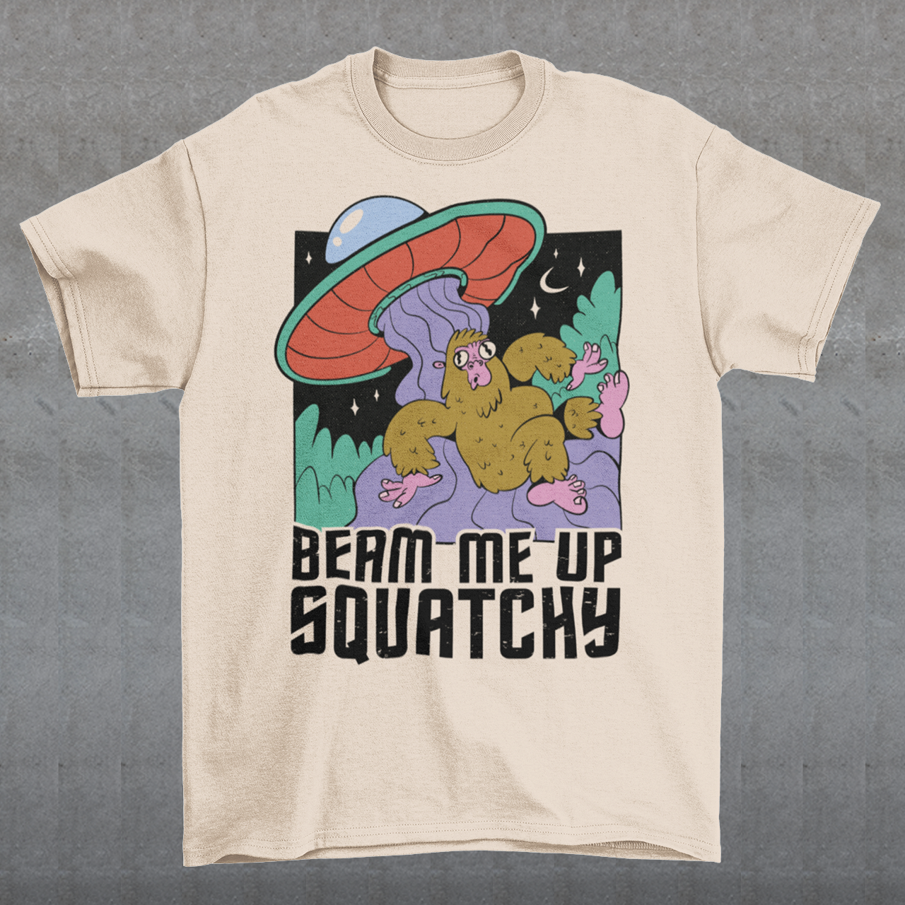 Introducing the extraterrestrial enigma that'll spark conversations and laughter wherever you go – the "BEAM ME UP SQUATCHY" t-shirt. This whimsical masterpiece seamlessly blends the worlds of cryptozoology and outer space, leaving a trail of intrigue and smiles in its wake. Set against a backdrop of midnight sky, this t-shirt showcases a captivating scene that defies conventional explanation.