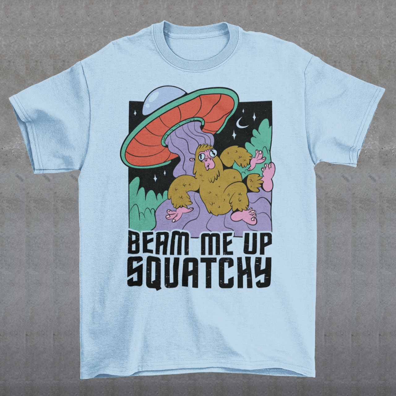 Introducing the extraterrestrial enigma that'll spark conversations and laughter wherever you go – the "BEAM ME UP SQUATCHY" t-shirt. This whimsical masterpiece seamlessly blends the worlds of cryptozoology and outer space, leaving a trail of intrigue and smiles in its wake. Set against a backdrop of midnight sky, this t-shirt showcases a captivating scene that defies conventional explanation.