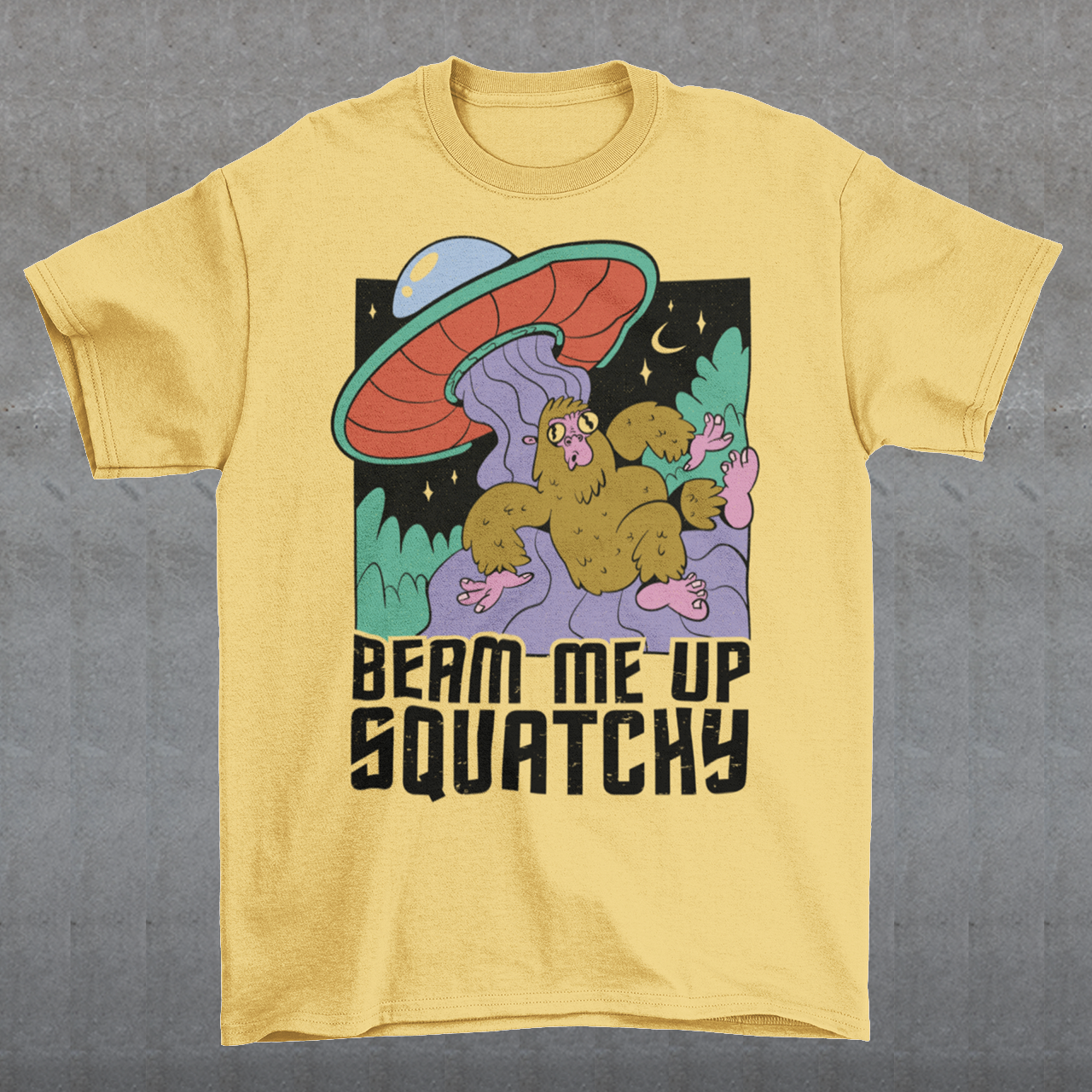 Introducing the extraterrestrial enigma that'll spark conversations and laughter wherever you go – the "BEAM ME UP SQUATCHY" t-shirt. This whimsical masterpiece seamlessly blends the worlds of cryptozoology and outer space, leaving a trail of intrigue and smiles in its wake. Set against a backdrop of midnight sky, this t-shirt showcases a captivating scene that defies conventional explanation.