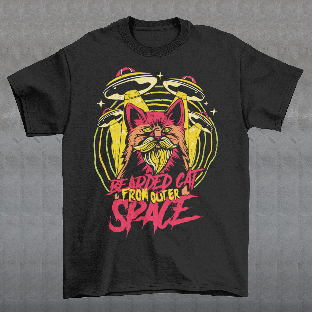 Prepare to embark on a cosmic adventure with our remarkable t-shirt featuring a bearded cat in outer space, accompanied by UFOs. This extraordinary design blends whimsy, imagination, and a touch of mystery, creating a visual feast for the eyes. At the center of the design, a majestic bearded cat takes on an otherworldly presence, its fur flowing like cosmic clouds. The cat's gaze is fixed on the vastness of space, exuding an air of curiosity and wonder.