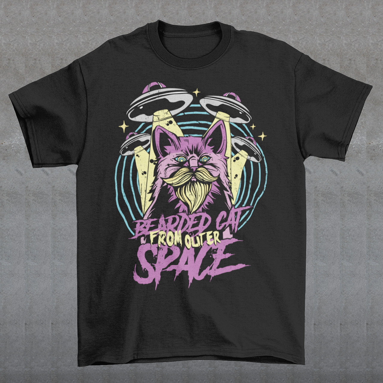 Prepare to embark on a cosmic adventure with our remarkable t-shirt featuring a bearded cat in outer space, accompanied by UFOs. This extraordinary design blends whimsy, imagination, and a touch of mystery, creating a visual feast for the eyes. At the center of the design, a majestic bearded cat takes on an otherworldly presence, its fur flowing like cosmic clouds. The cat's gaze is fixed on the vastness of space, exuding an air of curiosity and wonder.