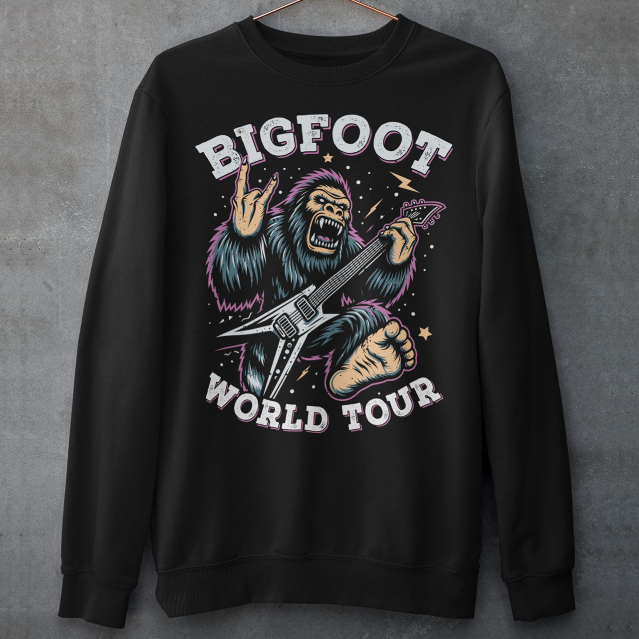 Introducing the ultimate sweatshirt for cryptid enthusiasts and music lovers alike! This vibrant design features the legendary Bigfoot, rocking out on an electric guitar with unparalleled style and energy. Bigfoot, depicted in dynamic detail, stands mid-riff, his shaggy fur flying as he strums the guitar with electrifying intensity. Around this striking image, bold text proudly declares "BIGFOOT WORLD TOUR."