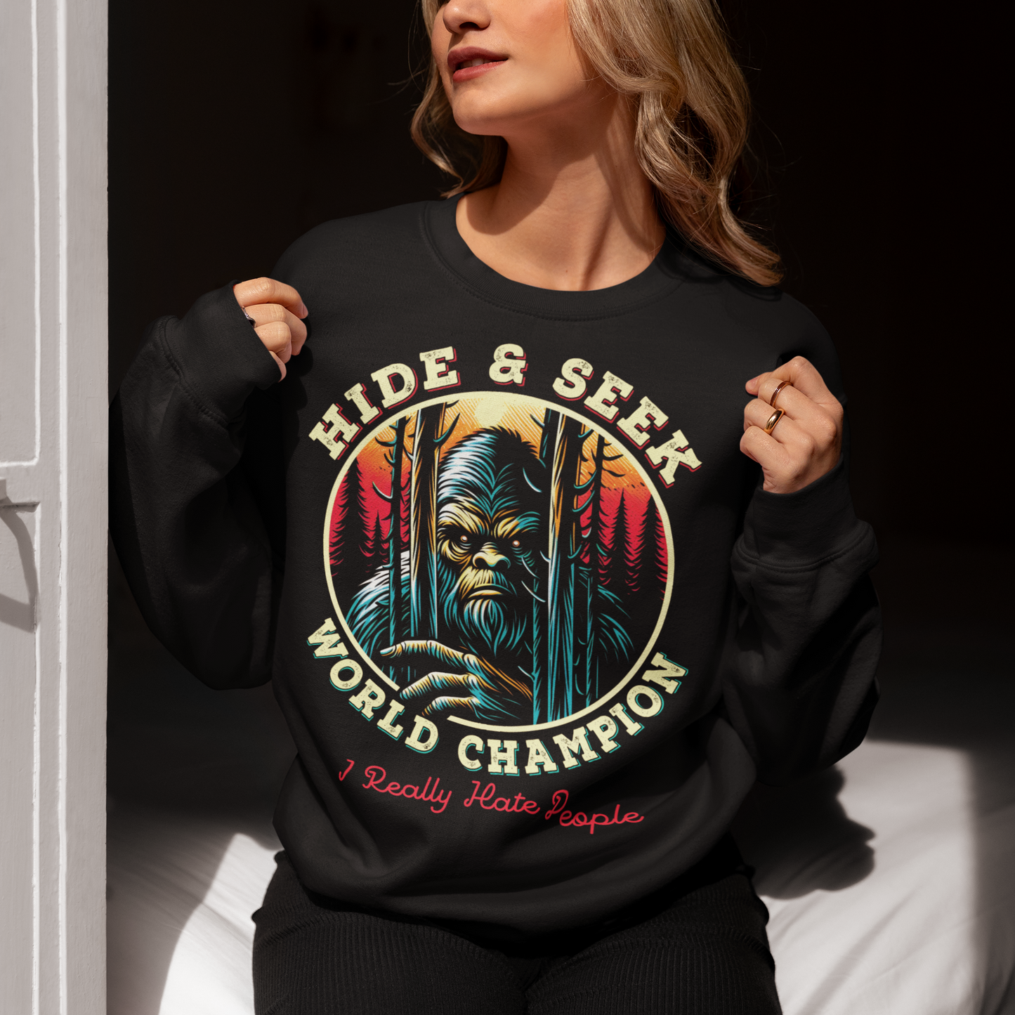 Unleash your playful side with our exclusive "Hide and Seek World Champion" Sweatshirt! This unique sweatshirt features an artistic rendition of Bigfoot peeking through a dense forest of towering trees. With a mischievous glint in his eyes, the legendary creature embodies the ultimate master of hide and seek. The bold, vintage-style text reads "HIDE and SEEK WORLD CHAMPION," celebrating Bigfoot's elusive charm.