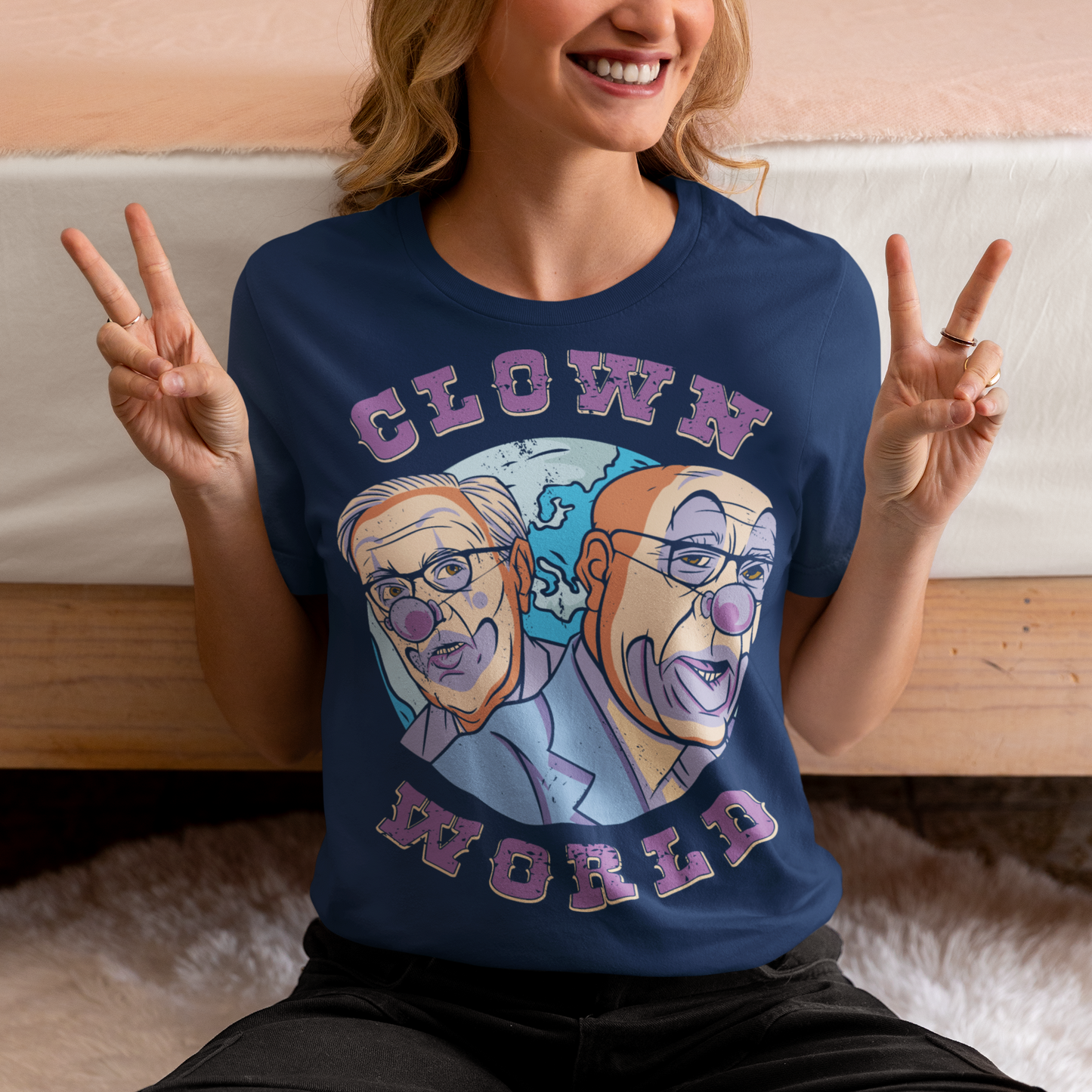 This bold and colorful t-shirt features a playful design that captures the absurdity and chaos of our modern times. With a cast of wacky characters, including clowns, jesters, and other oddball creatures, this shirt is perfect for anyone who loves a good laugh or wants to show their disdain for the status quo.
