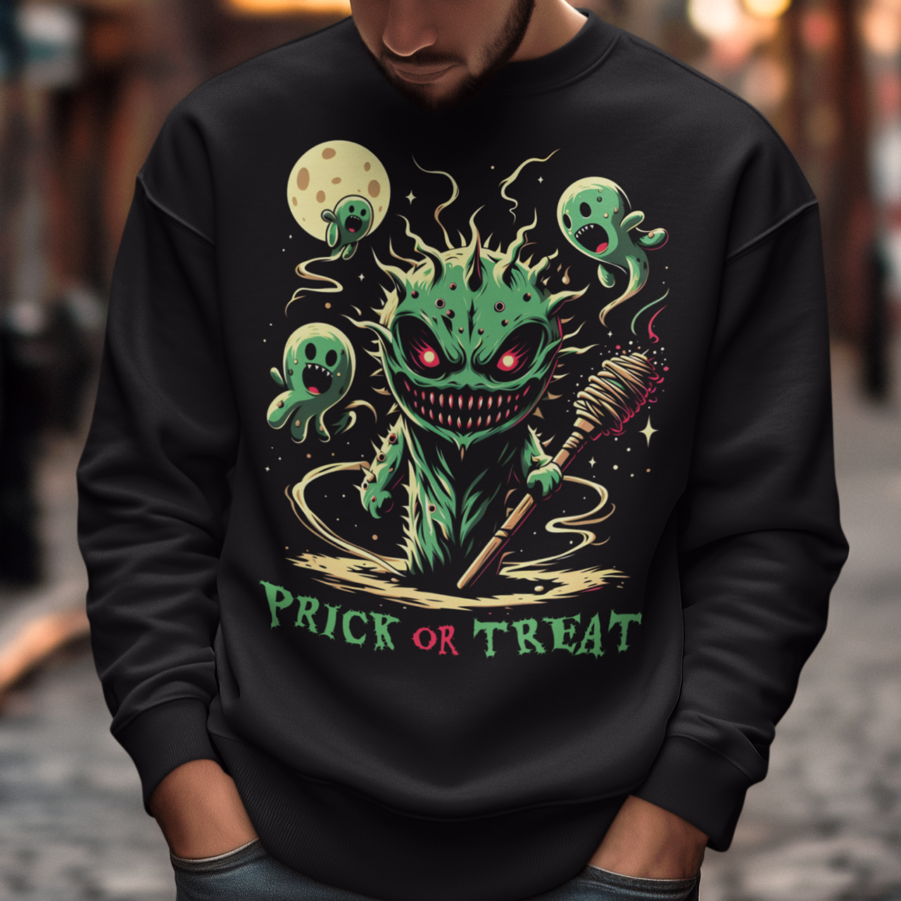 Black Halloween sweatshirt of a scary cactus with cactus ghosts with text underneath "PRICK OR TREAT".