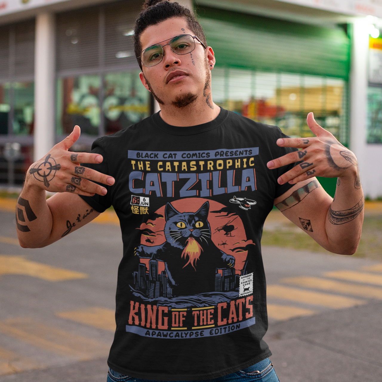 Unleash your inner kaiju fan with our epic CATZILLA t-shirt! This bold comic book-inspired design features a towering feline behemoth, "Catzilla," reigning supreme over a chaotic cityscape. With glowing yellow eyes, razor-sharp claws, and breathing fire, Catzilla looms above crumbling skyscrapers swiping at helicopters. The background is a vibrant explosion of yellows and oranges, showcasing a fiery skyline that screams action and adventure.