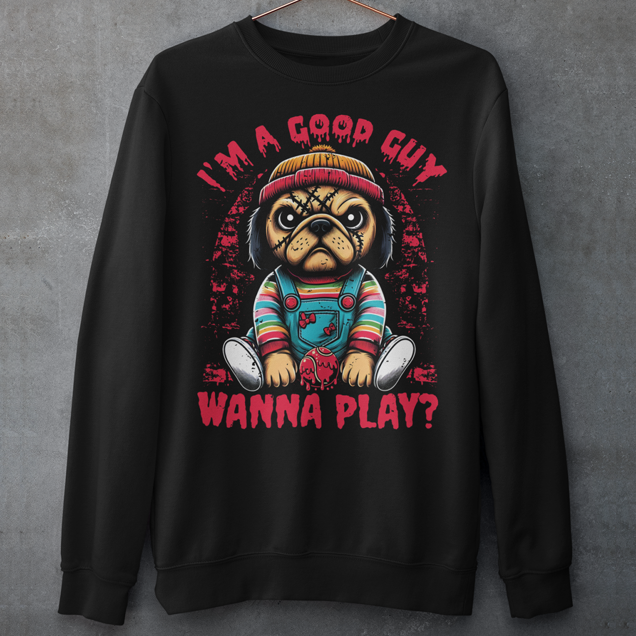 Black sweatshirt of a Chucky Pug with text above "I'M A GOOD GUY". Text below WANNA PLAY?