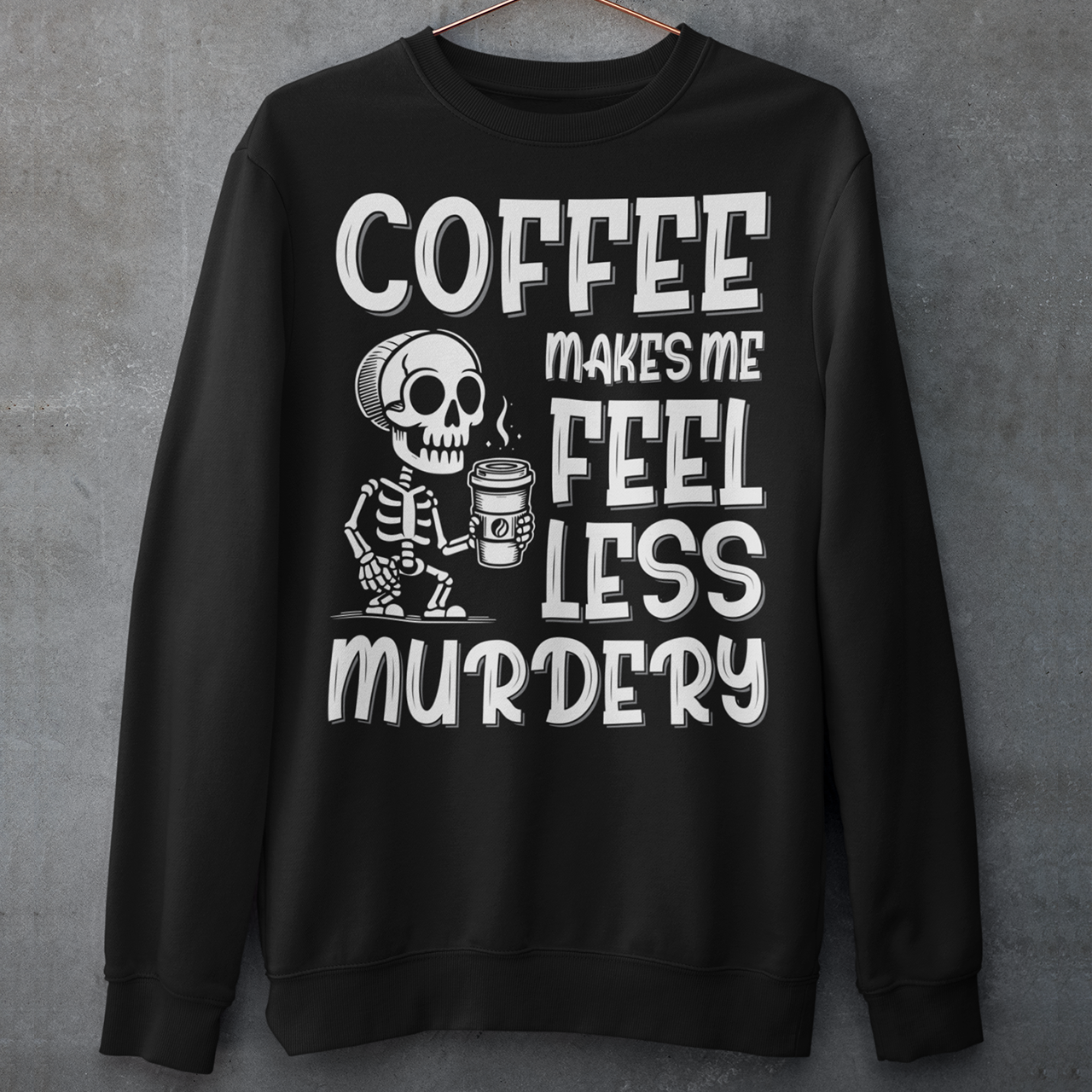 Introducing our "Coffee Makes Me Feel Less Murdery" Sweatshirt – the perfect blend of dark humor and everyday caffeine dependence. This unique design features a laid-back skeleton holding a steaming cup of coffee, perfectly capturing the sentiment that a good brew can make even the most undead feel more alive. The bold text "COFFEE MAKES ME FEEL LESS MURDERY" adds a cheeky twist, making this shirt a must-have for coffee lovers with a quirky sense of humor.