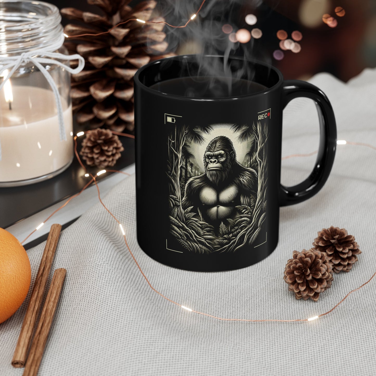 Black mug of Bigfoot being recorded looking through the trees.