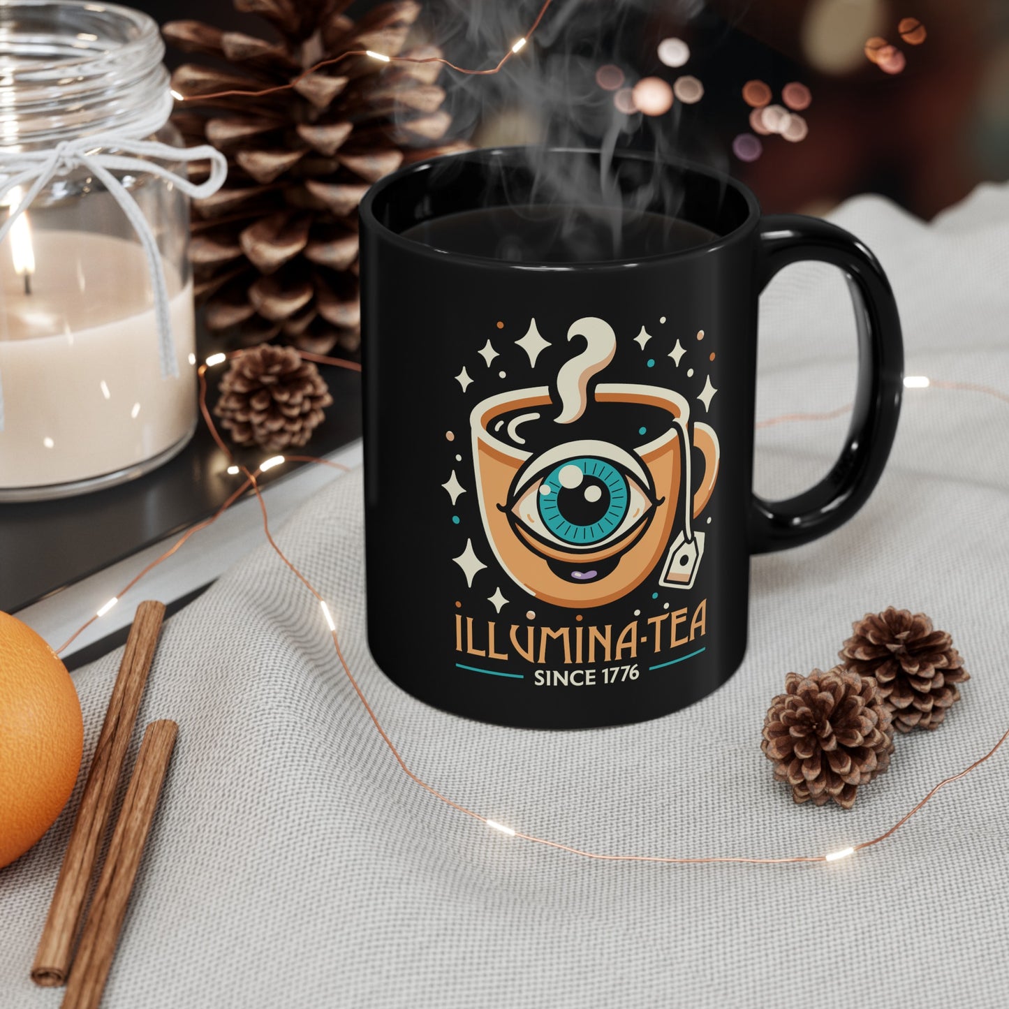 Black mug of an Illuminati cup with text Illumina-Tea