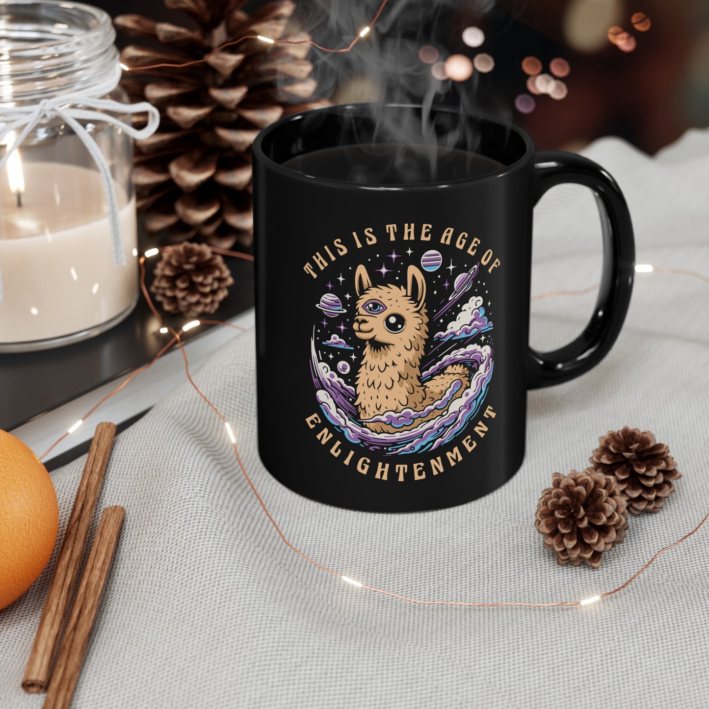 Black mug of a Llama with a third eye in space with text THIS IS THE AGE OF ENLIGHTENMENT.