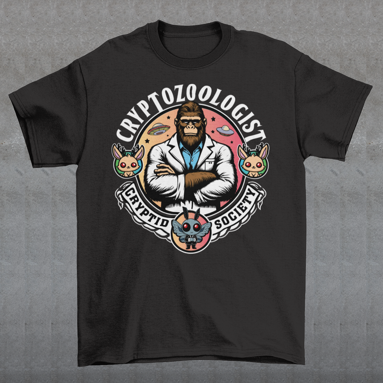 Introducing our enigmatic Cryptozoologist t-shirt, where the mysteries of the unknown converge in an eye-catching design! Picture this: a towering Bigfoot, not merely a creature of folklore, but an esteemed scientist of the wilderness. Behind this enigmatic figure, the night sky is alive with the shimmering presence of UFOs, hinting at extraterrestrial encounters and the secrets they may hold.