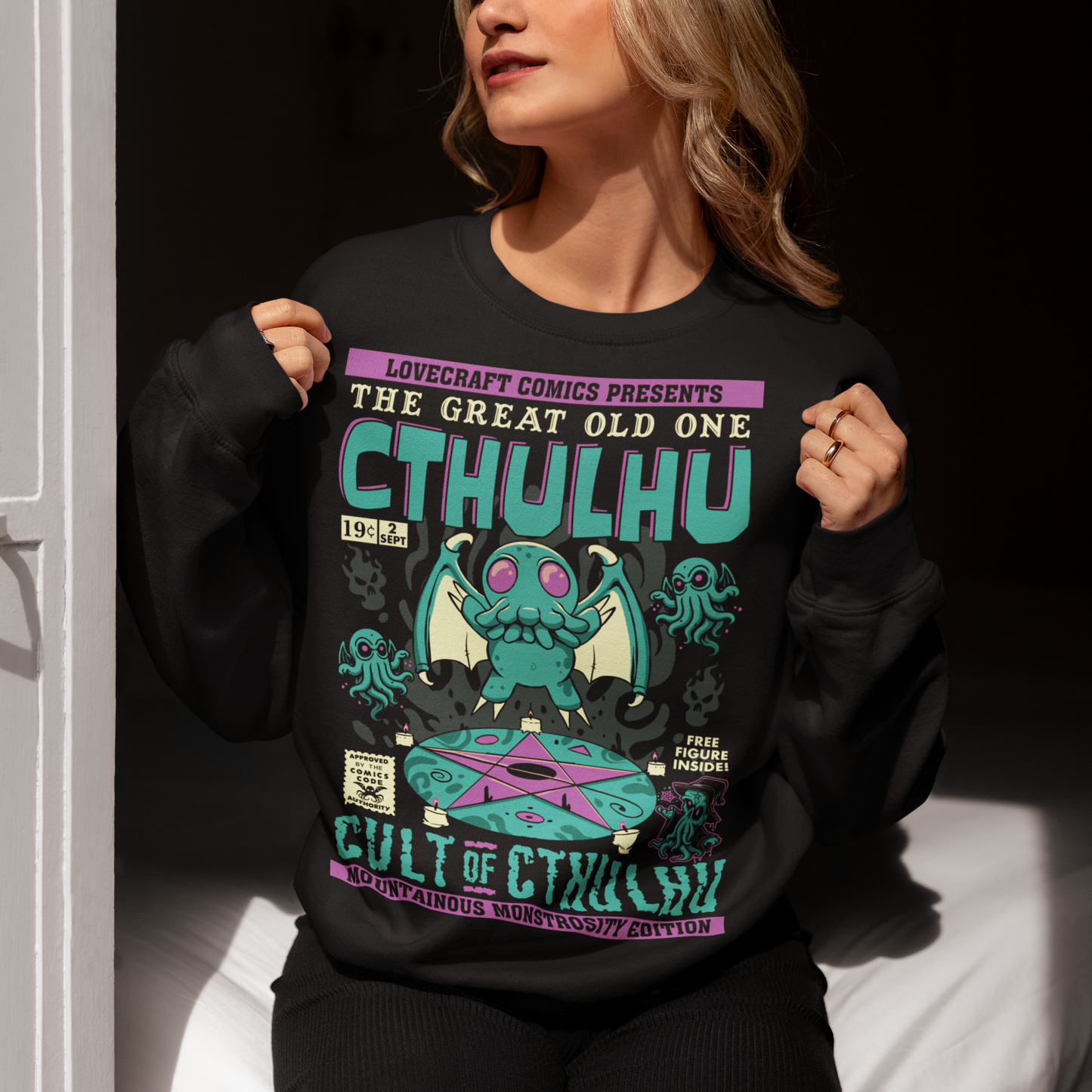 Black sweatshirt of a comic book design of Cthulhu in a cult.