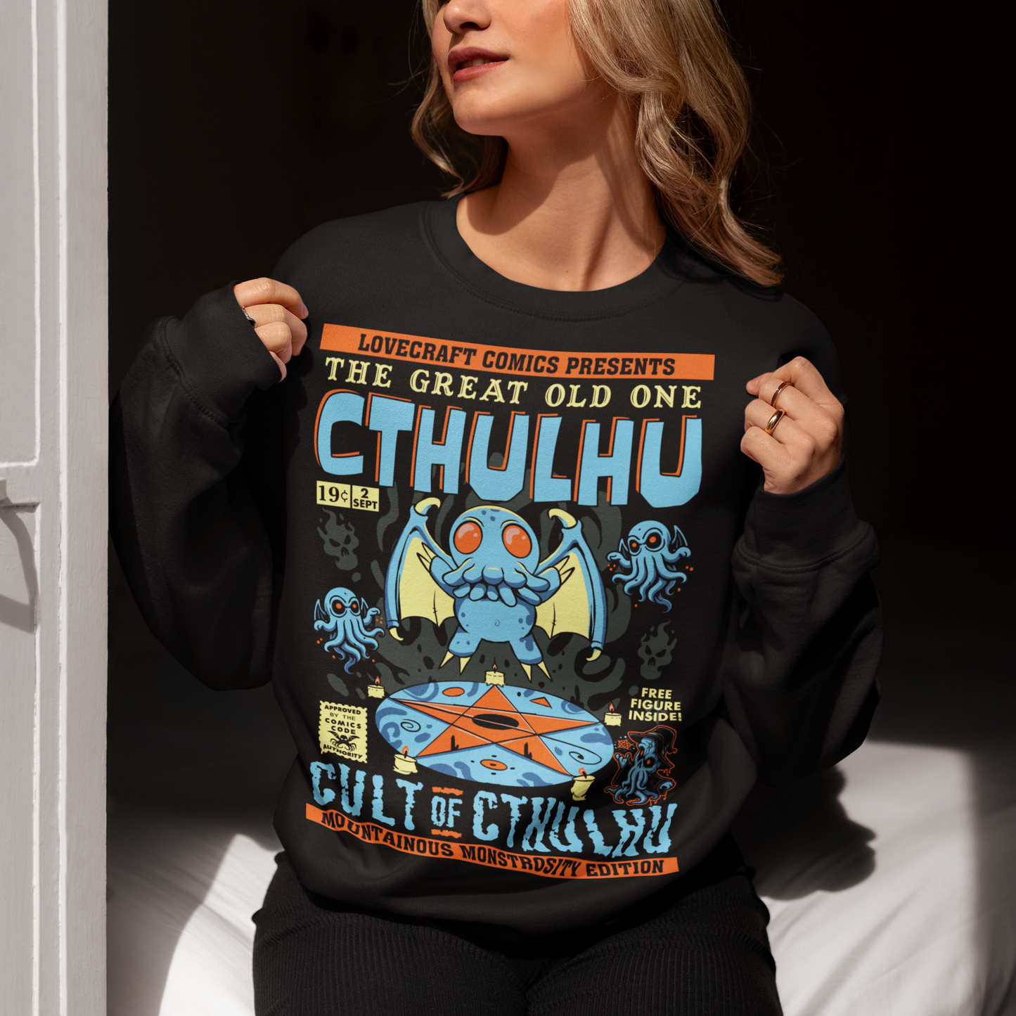 Black Sweatshirt of a comic book design of Cthulhu in a cult.