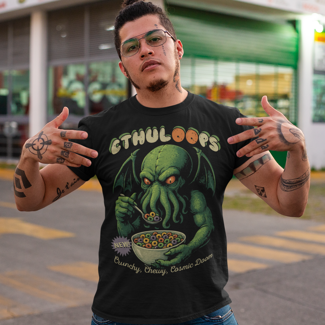 Start your mornings with a cosmic crunch! This t-shirt features a playful yet menacing design of Cthulhu casually enjoying a bowl of cereal, with the bold text “CTHULOOPS” splashed across the front. Equal parts creepy and hilarious, it’s a mashup of Lovecraftian horror and Saturday morning cartoons. This shirt is perfect for fans of cosmic horror, quirky humor, and breakfast that drives you mad.