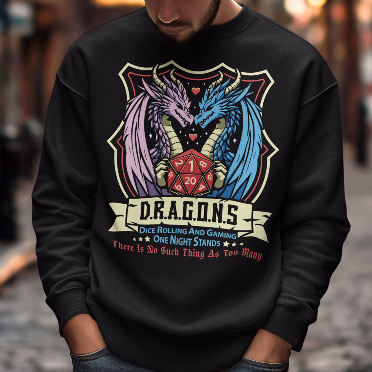 Embrace your inner adventurer with this bold and witty D.R.A.G.O.N.S. Shield Emblem Sweatshirt. At the heart of the design is a powerful crest-style shield, flanked by a fierce male and female dragon, symbolizing strength, balance, and epic storytelling. Centered within the shield is a classic RPG dice, gleaming with gamer pride. Perfect for tabletop warriors, RPG fans, and those who roll for both initiative and fun.