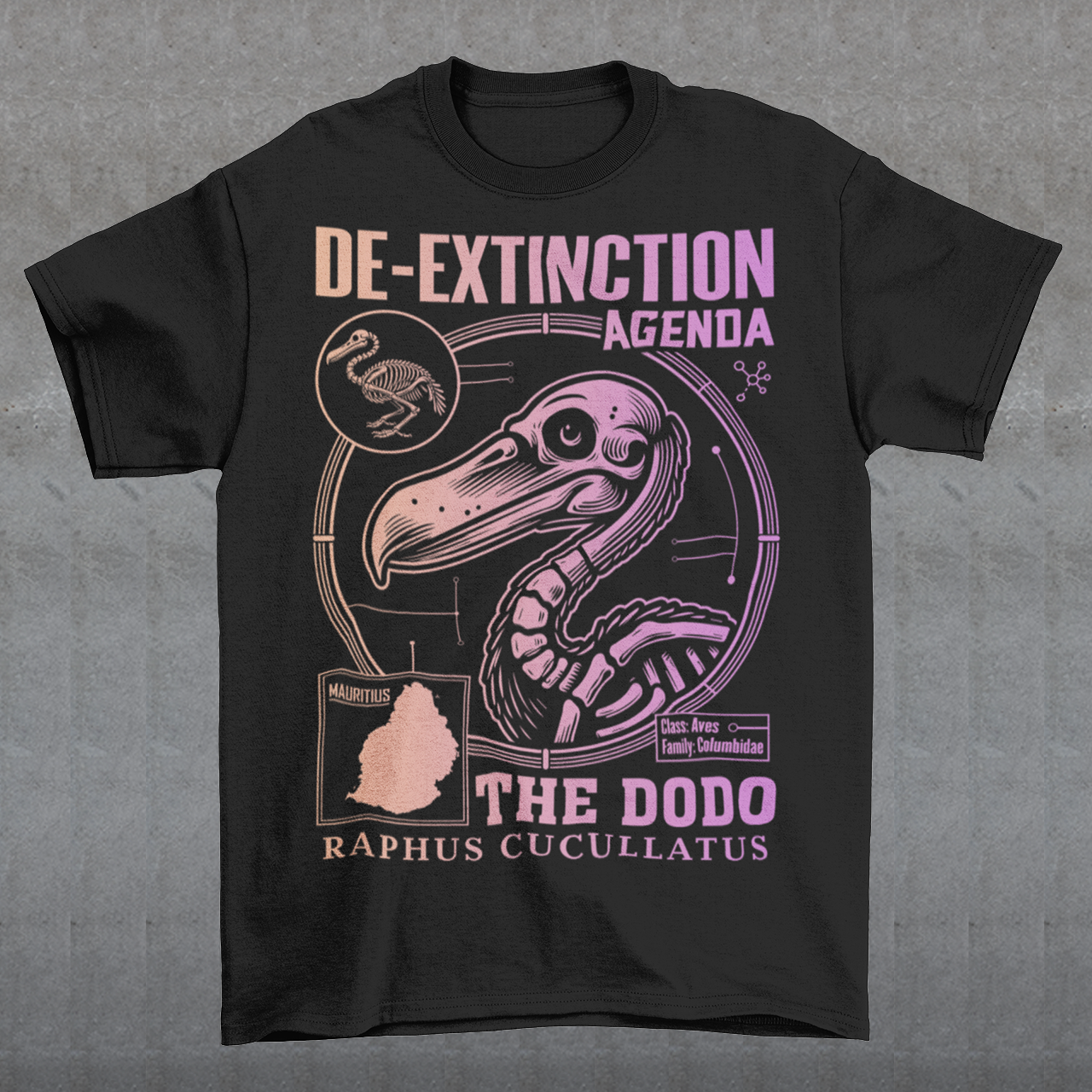 A graphic t-shirt featuring a stylized illustration of a dodo bird, standing upright with a proud, almost defiant expression. The dodo is depicted in vibrant colors, blending realism with a slightly cartoonish flair. Above the bird, bold, capitalized text reads "DE-EXTINCTION AGENDA" in a futuristic font, suggesting a science fiction or activist tone. The design evokes themes of genetic engineering, conservation, and the revival of extinct species. The shirt is a statement piece with humor.