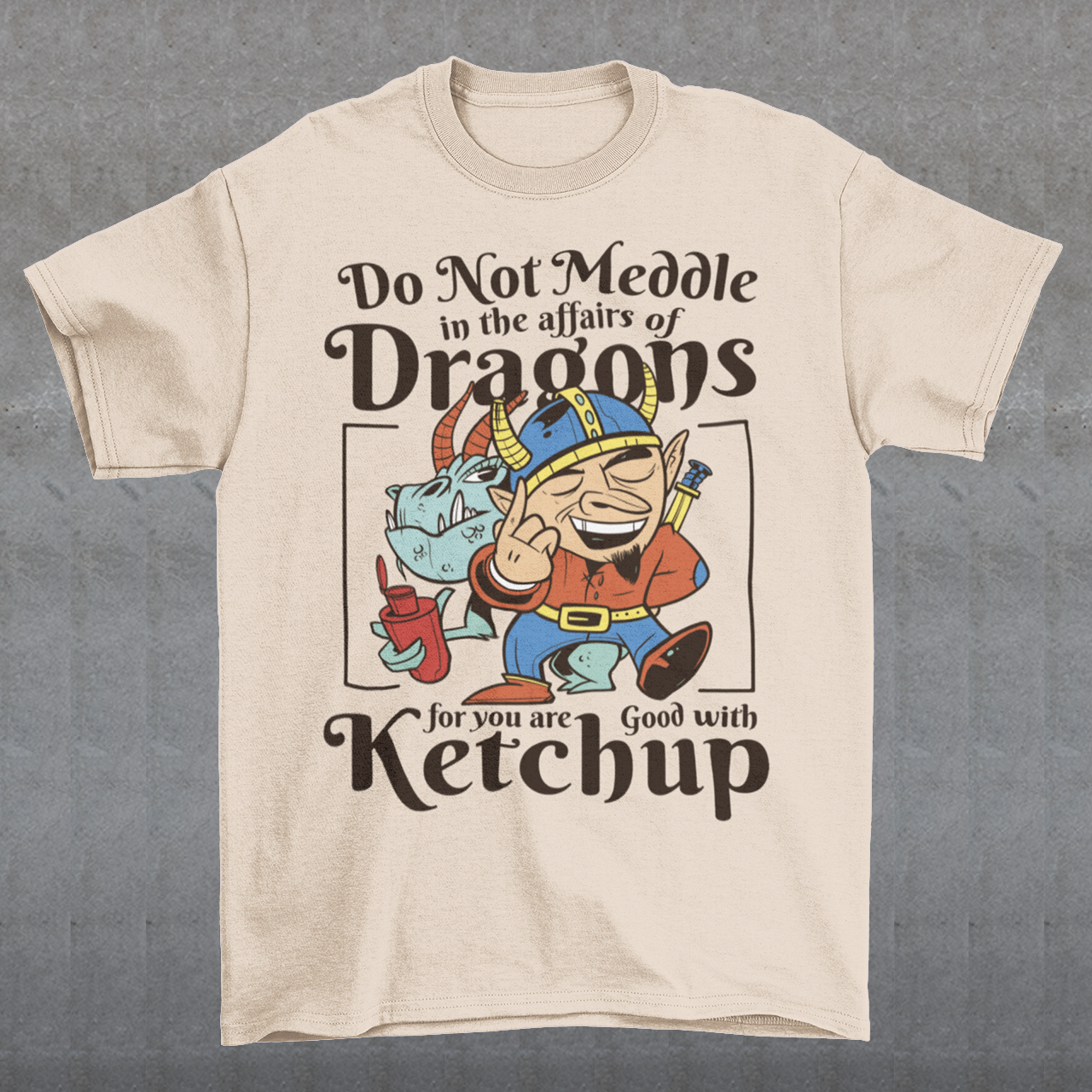 Introducing our whimsically fierce and flavorful "Dragon Connoisseur" T-shirt! This eye-catching design features a majestic dragon with a mischievous grin, proudly holding a bottle of ketchup, standing ominously behind a brave Viking. The caption, "DO NOT MEDDLE IN THE AFFAIRS OF DRAGONS FOR YOU ARE GOOD WITH KETCHUP," adds a touch of humor and a warning to all who dare to challenge the fiery and saucy taste preferences of these mythical creatures.