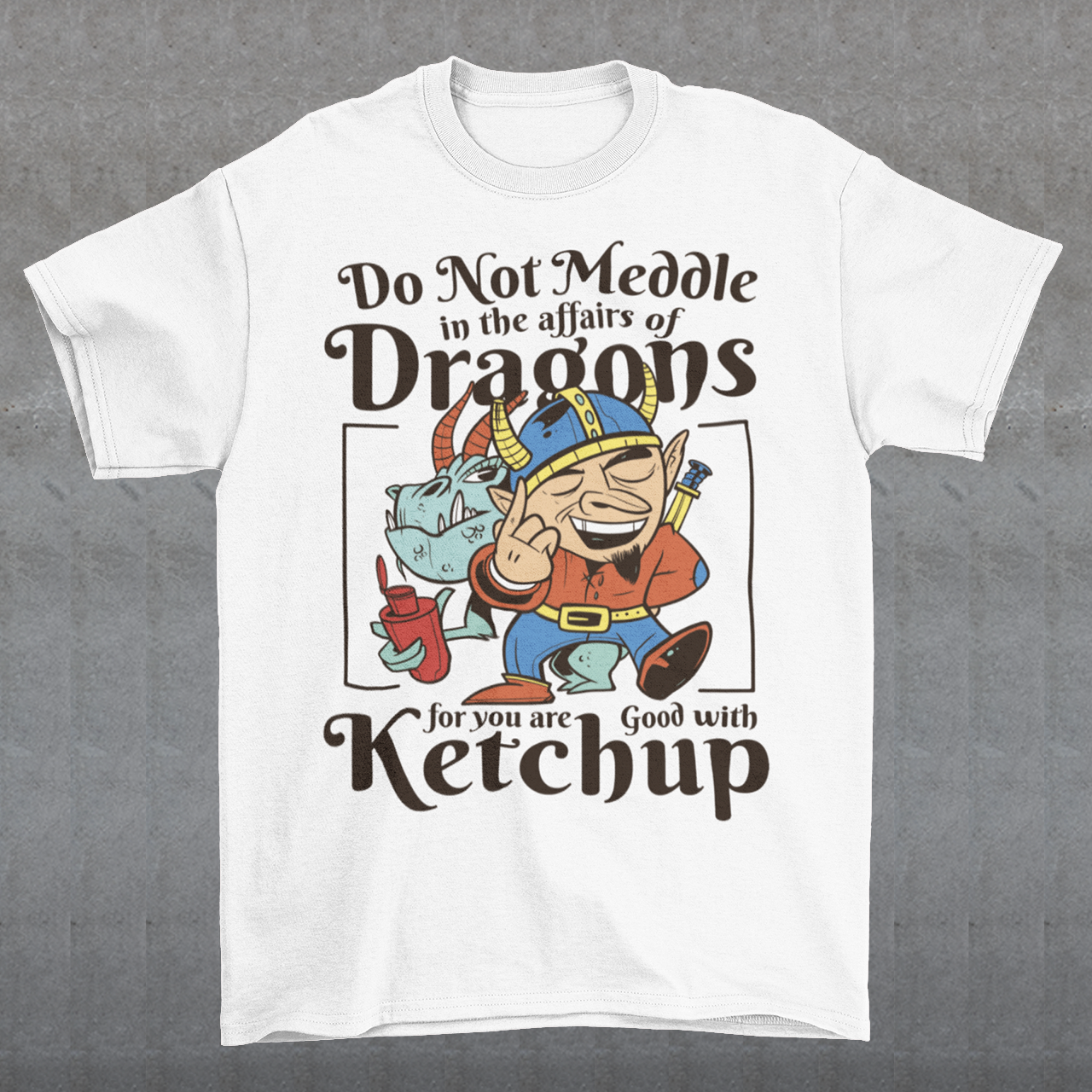 Introducing our whimsically fierce and flavorful "Dragon Connoisseur" T-shirt! This eye-catching design features a majestic dragon with a mischievous grin, proudly holding a bottle of ketchup, standing ominously behind a brave Viking. The caption, "DO NOT MEDDLE IN THE AFFAIRS OF DRAGONS FOR YOU ARE GOOD WITH KETCHUP," adds a touch of humor and a warning to all who dare to challenge the fiery and saucy taste preferences of these mythical creatures.