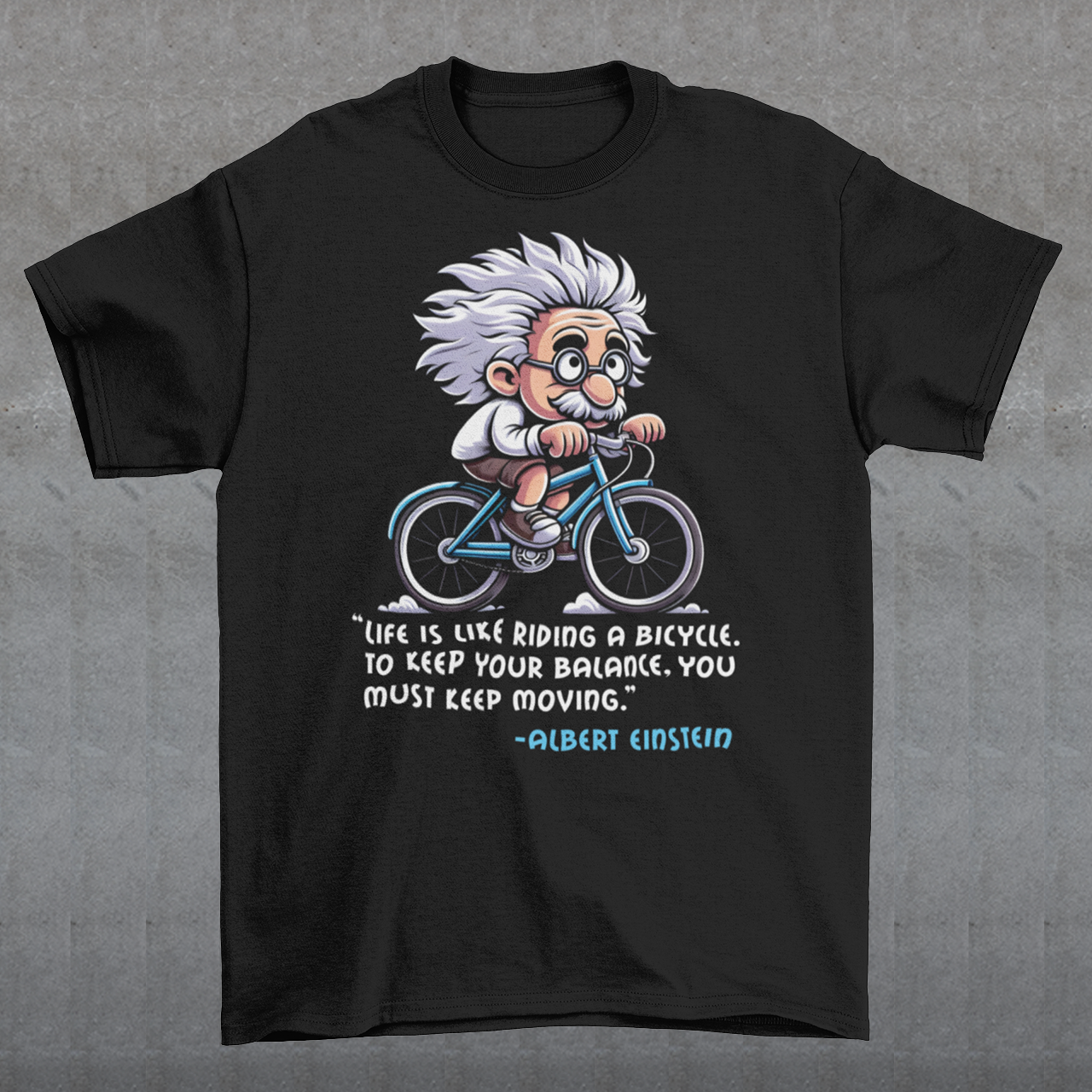 Discover the perfect blend of intellect and inspiration with our "Einstein Cycling" T-shirt. This unique design features the legendary physicist Albert Einstein enjoying a leisurely bike ride, embodying both his playful spirit and his profound wisdom. Below the whimsical illustration, you'll find one of Einstein's most motivational quotes: "Life is like riding a bicycle. To keep your balance, you must keep moving."