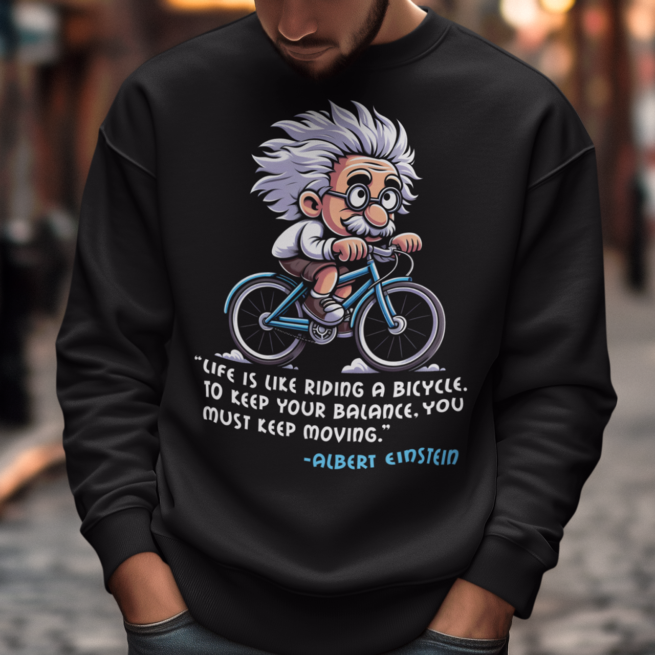 Discover the perfect blend of intellect and inspiration with our "Einstein Cycling" Sweatshirt. This unique design features the legendary physicist Albert Einstein enjoying a leisurely bike ride, embodying both his playful spirit and his profound wisdom. Below the whimsical illustration, you'll find one of Einstein's most motivational quotes: "Life is like riding a bicycle. To keep your balance, you must keep moving."