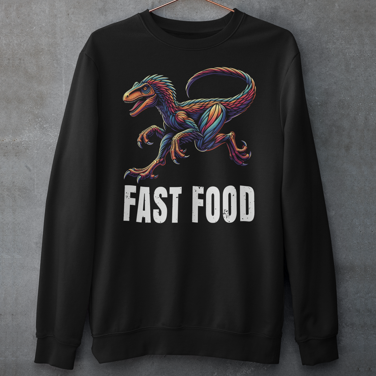 Introducing our "Fast Food Raptor" Sweatshirt, where prehistoric power meets modern humor! This unique design features a dynamically illustrated raptor in mid-chase, showcasing its legendary speed and agility. Beneath the fierce yet playful raptor, bold text reads "FAST FOOD," delivering a clever twist on the concept of quick bites. Perfect for dinosaur enthusiasts, humor lovers, and anyone who enjoys a good pun, this Sweatshirt combines vibrant artistry with a touch of wit.