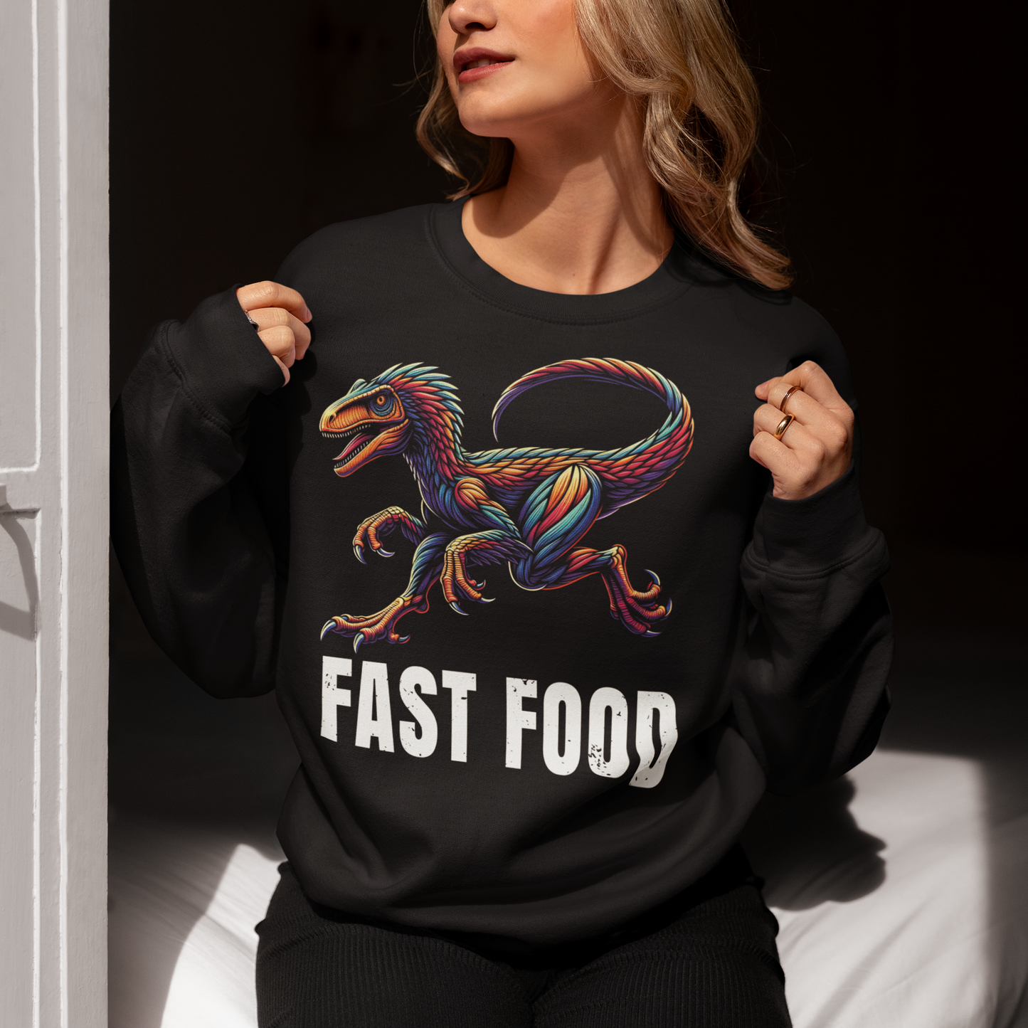 Introducing our "Fast Food Raptor" Sweatshirt, where prehistoric power meets modern humor! This unique design features a dynamically illustrated raptor in mid-chase, showcasing its legendary speed and agility. Beneath the fierce yet playful raptor, bold text reads "FAST FOOD," delivering a clever twist on the concept of quick bites. Perfect for dinosaur enthusiasts, humor lovers, and anyone who enjoys a good pun, this Sweatshirt combines vibrant artistry with a touch of wit.