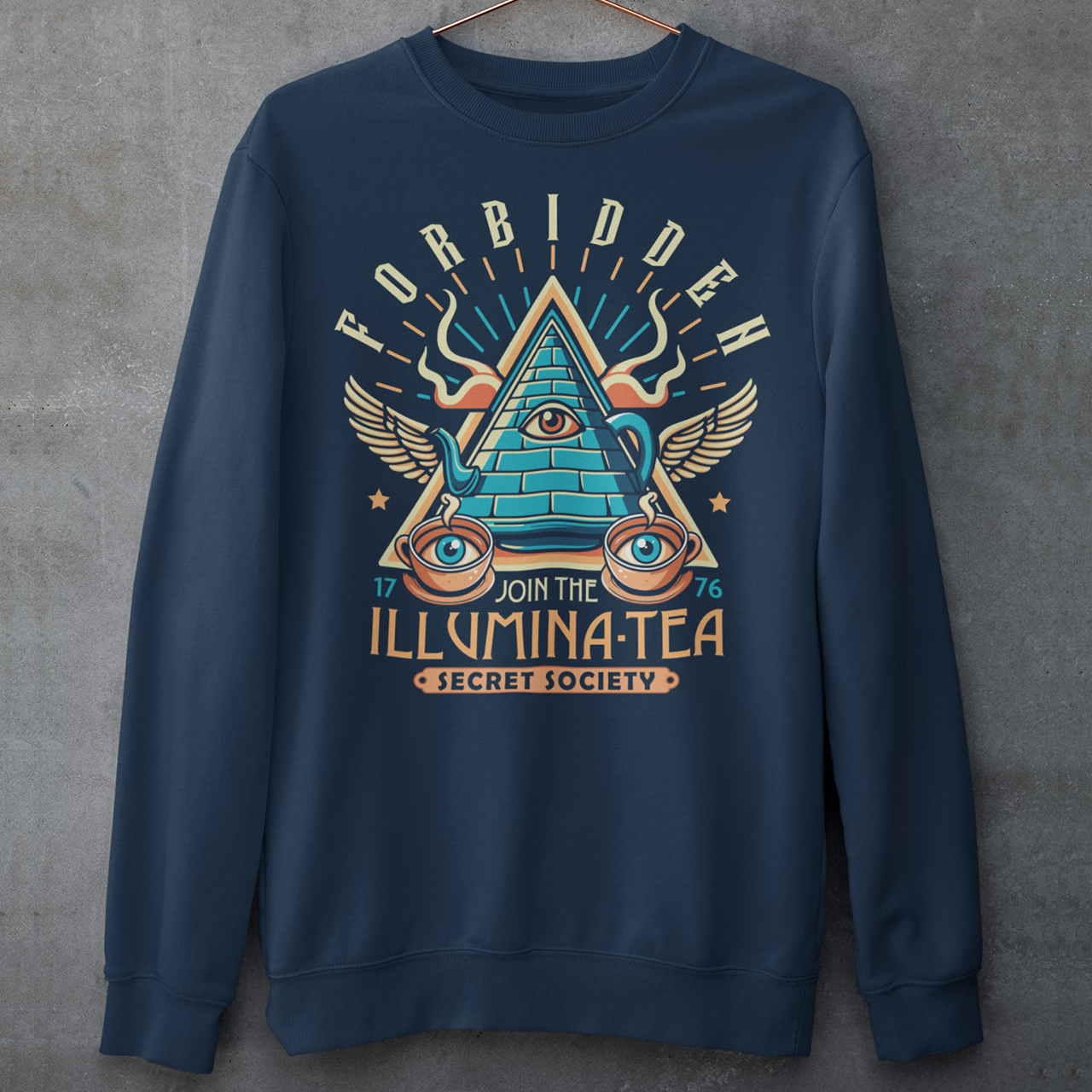 Step into the mysterious world of the Illuminati with this enigmatic sweatshirt featuring a captivating design of a tea pot and cups, each adorned with iconic Illuminati symbols. Delve into the depths of secrecy as you sip your tea, knowing that you possess the knowledge of the ages. With its clever wordplay, the text "ILLUMINA-TEA" adds a playful twist, inviting intrigue and curiosity from those around you.