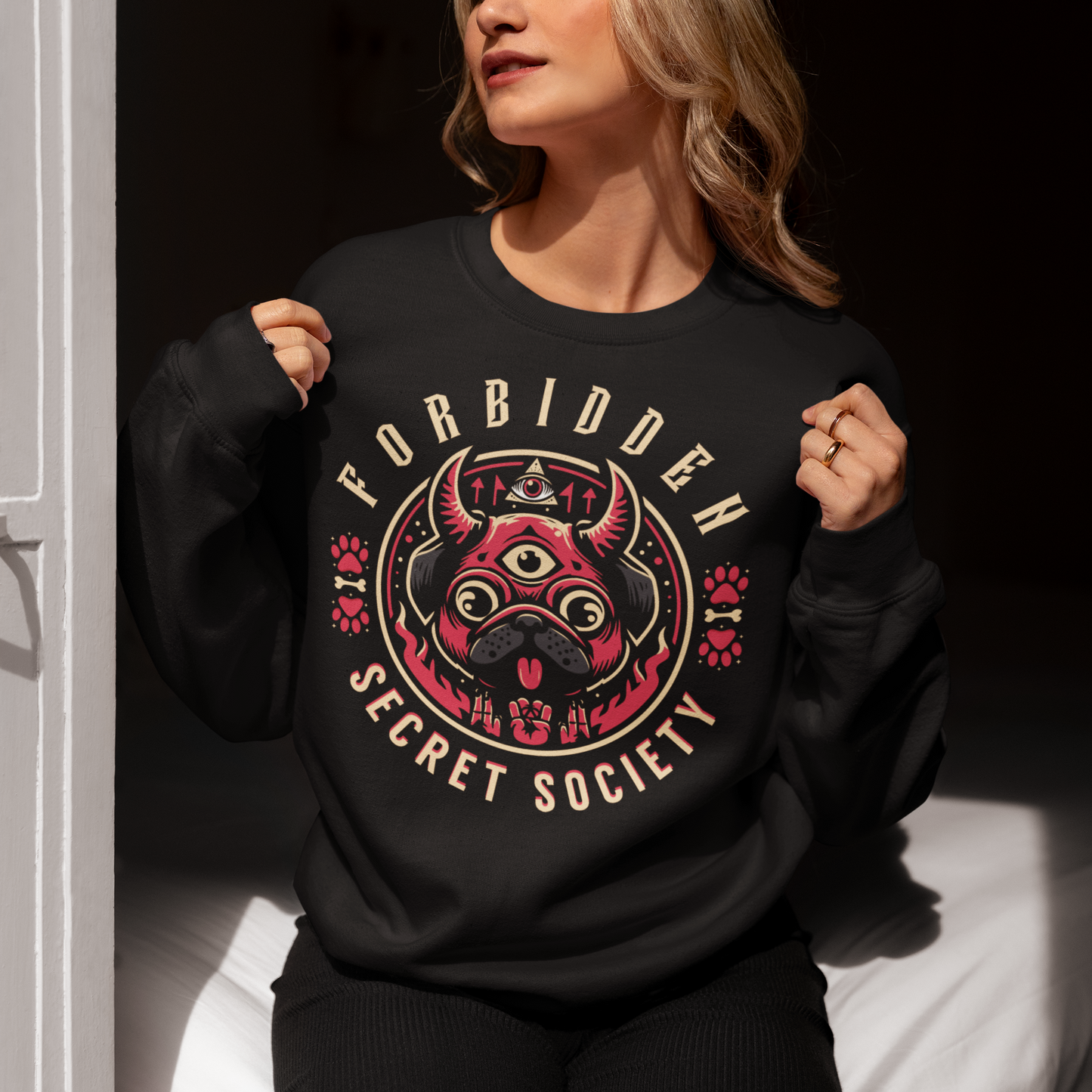 "Step into the enigmatic world of clandestine societies with our Forbidden Secret Society sweatshirt featuring the elusive Illuminati pug. This captivating design showcases a sloth adorned with symbolic imagery, including the all-seeing third eye, hinting at hidden knowledge and mystic insight. Embrace the intrigue and mystery as you don this unique sweatshirt, inviting curiosity and speculation wherever you go.
