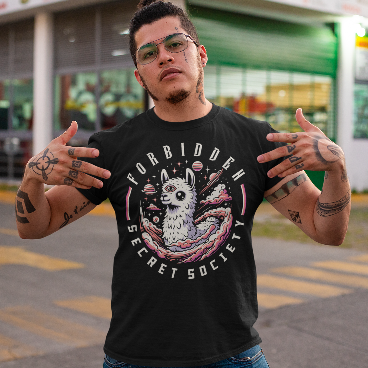 "Step into the enigmatic world of clandestine societies with our Forbidden Secret Society t-shirt featuring the elusive Illuminati Llama. This captivating design showcases a llama adorned with symbolic imagery, including the all-seeing third eye, hinting at hidden knowledge and mystic insight. Embrace the intrigue and mystery as you don this unique t-shirt, inviting curiosity and speculation wherever you go.