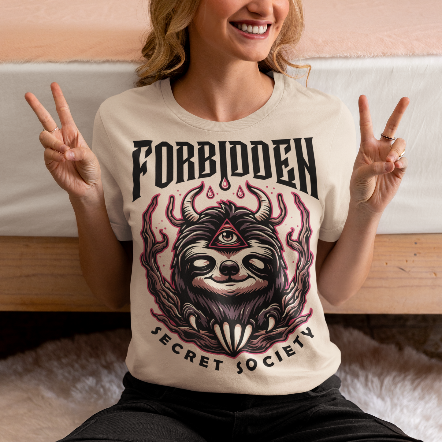 "Step into the enigmatic world of clandestine societies with our Forbidden Secret Society t-shirt featuring the elusive Illuminati sloth. This captivating design showcases a sloth adorned with symbolic imagery, including the all-seeing third eye, hinting at hidden knowledge and mystic insight. Embrace the intrigue and mystery as you don this unique tee, inviting curiosity and speculation wherever you go.