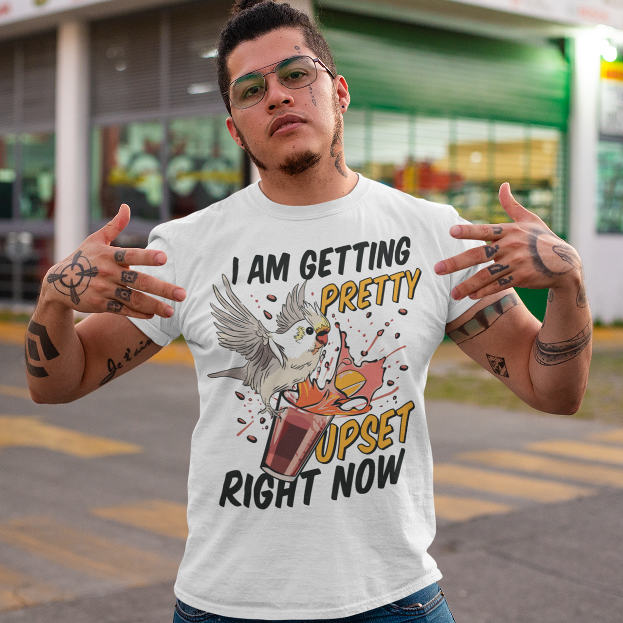 Introducing our whimsical and vibrant t-shirt featuring a mischievous cockatoo caught in a comical escapade. This design captures the playful spirit of this feathered troublemaker as it gleefully knocks over a meticulously crafted cocktail, sending colorful liquids splashing in all directions. The image perfectly portrays the unpredictable and endearing nature of these intelligent birds.
