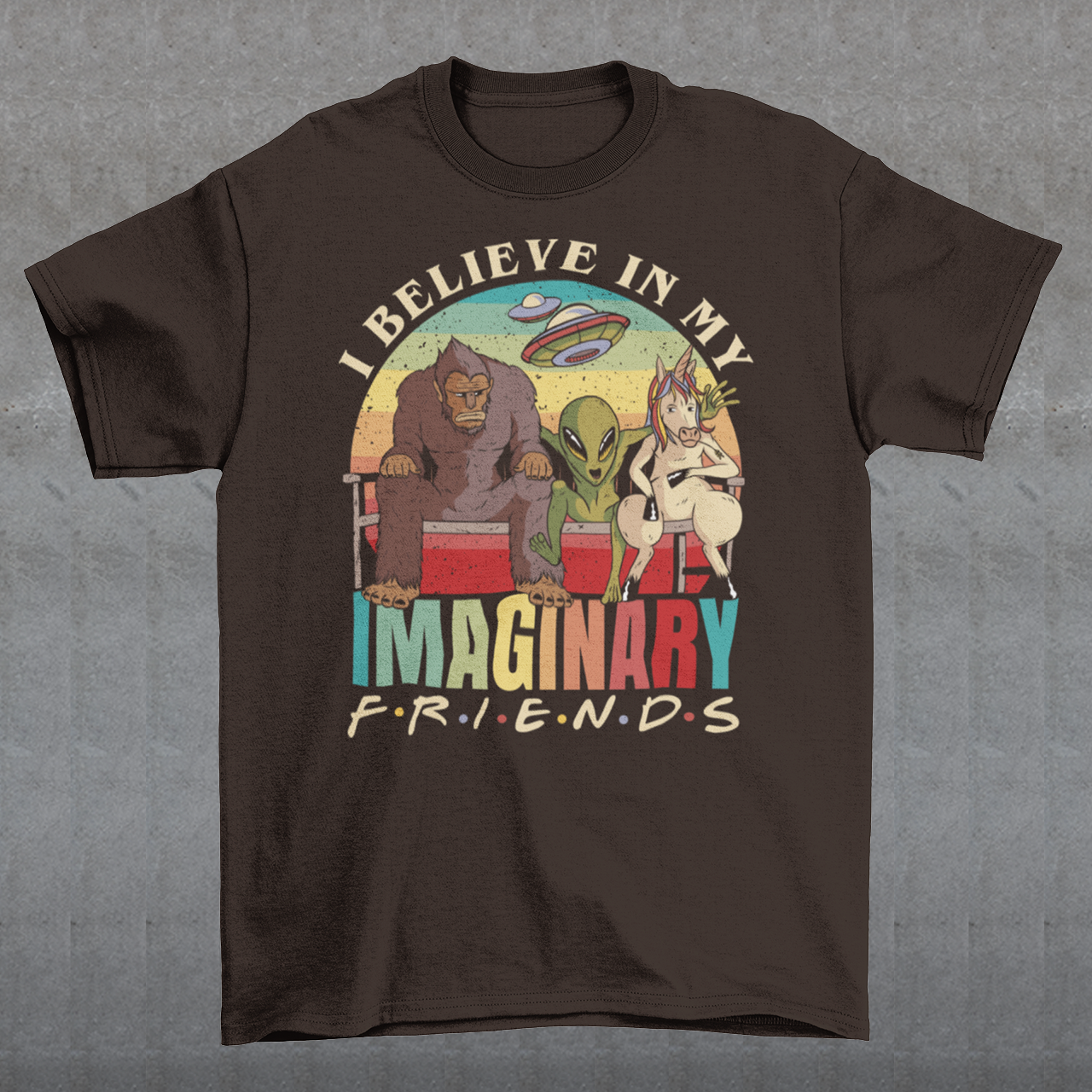 In the heart of this enchanting design, you'll find Bigfoot, the elusive creature of the woods, seated comfortably on a bench, embodying the essence of mystery and adventure. Right beside Bigfoot, an extraterrestrial visitor, with its classic big eyes and otherworldly charm, adds a touch of cosmic wonder to the scene. Completing this whimsical gathering is a majestic unicorn, its mane flowing gracefully, symbolizing purity and the magic of dreams.