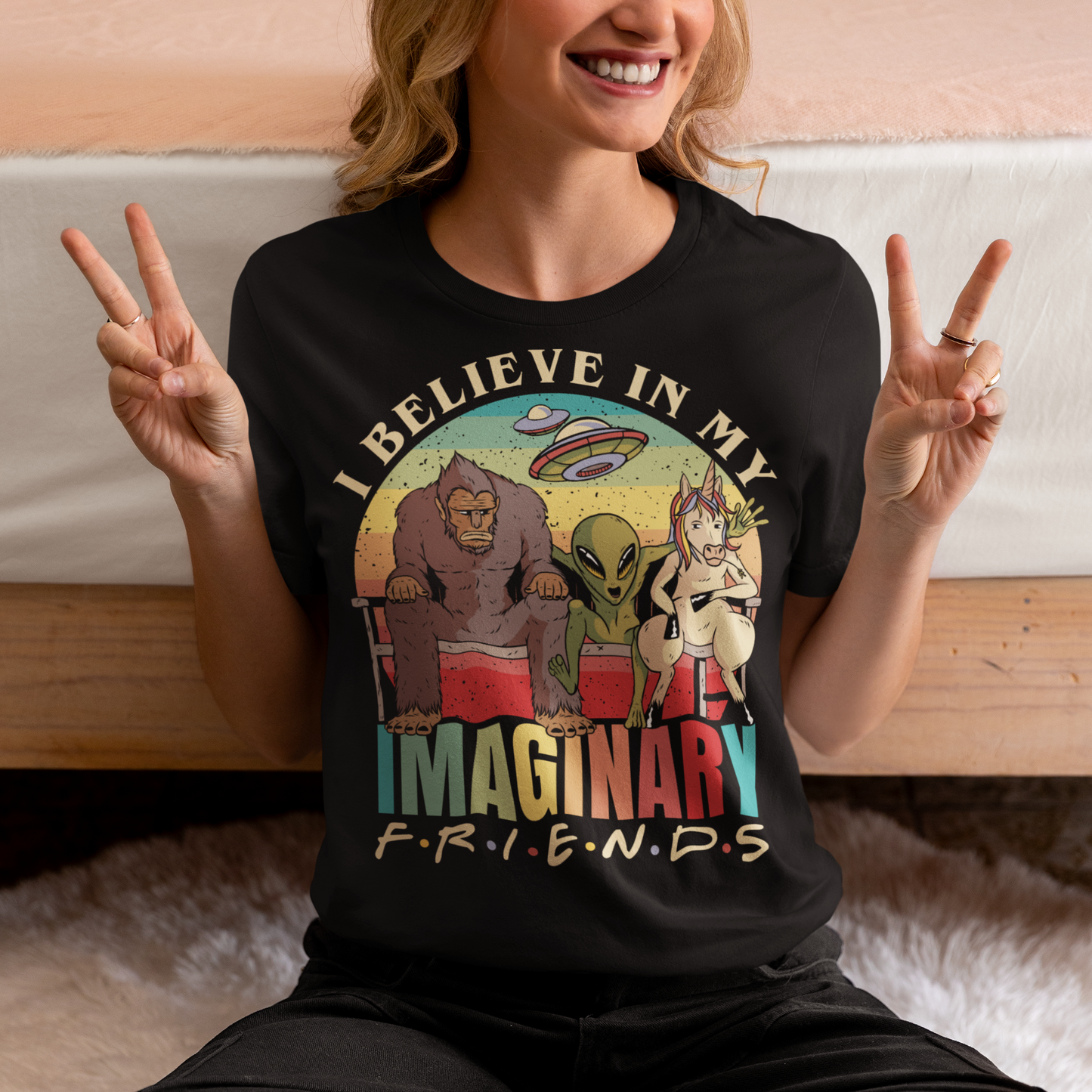 In the heart of this enchanting design, you'll find Bigfoot, the elusive creature of the woods, seated comfortably on a bench, embodying the essence of mystery and adventure. Right beside Bigfoot, an extraterrestrial visitor, with its classic big eyes and otherworldly charm, adds a touch of cosmic wonder to the scene. Completing this whimsical gathering is a majestic unicorn, its mane flowing gracefully, symbolizing purity and the magic of dreams.