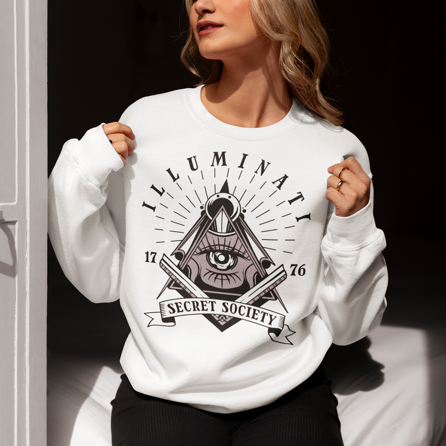 Step into the enigmatic world of secret societies with this captivating and thought-provoking sweatshirt. Featuring the iconic Free Mason symbol, this garment is a bold statement piece that invites intrigue and curiosity. At the heart of this design lies the timeless and mysterious emblem of the Free Masons, an ancient symbol that has captivated minds for centuries.