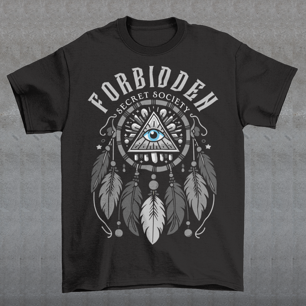 "Step into the enigmatic world of clandestine knowledge with our Illuminati Dreamcatcher T-shirt. Featuring an intricate design that merges the mystique of the Illuminati symbol with the cultural heritage of dreamcatchers, this tee is a fusion of intrigue and symbolism. The central eye, a hallmark of Illuminati iconography, peers out from the heart of the dreamcatcher, symbolizing the pursuit of hidden truths and enlightenment.