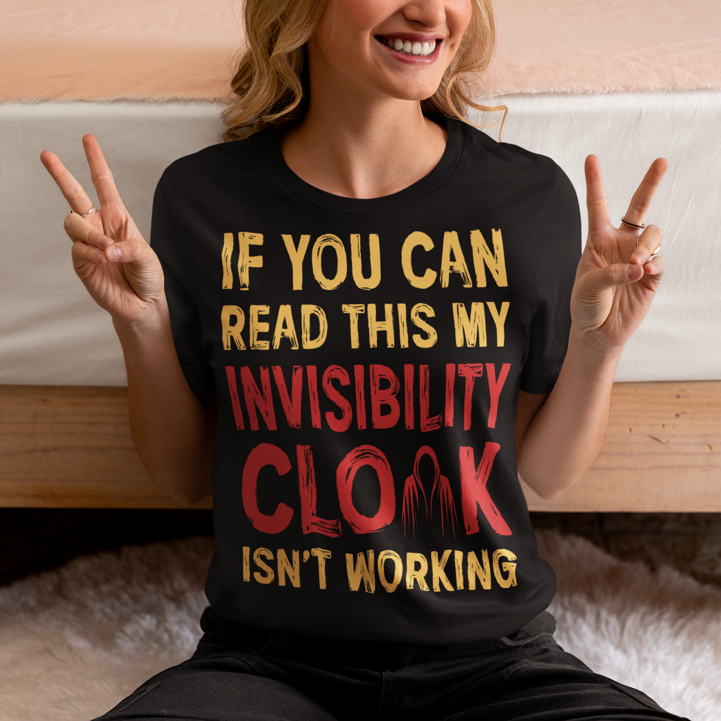 Turn heads and raise a few laughs with this clever and quirky tee! Featuring the bold text “IF YOU CAN READ THIS MY INVISIBILITY CLOAK ISN'T WORKING”, this shirt is perfect for wizards, pranksters, and introverts alike. Whether you're a fan of fantasy, sarcasm, or just enjoy flying under the radar, this shirt delivers a magical dose of humor.