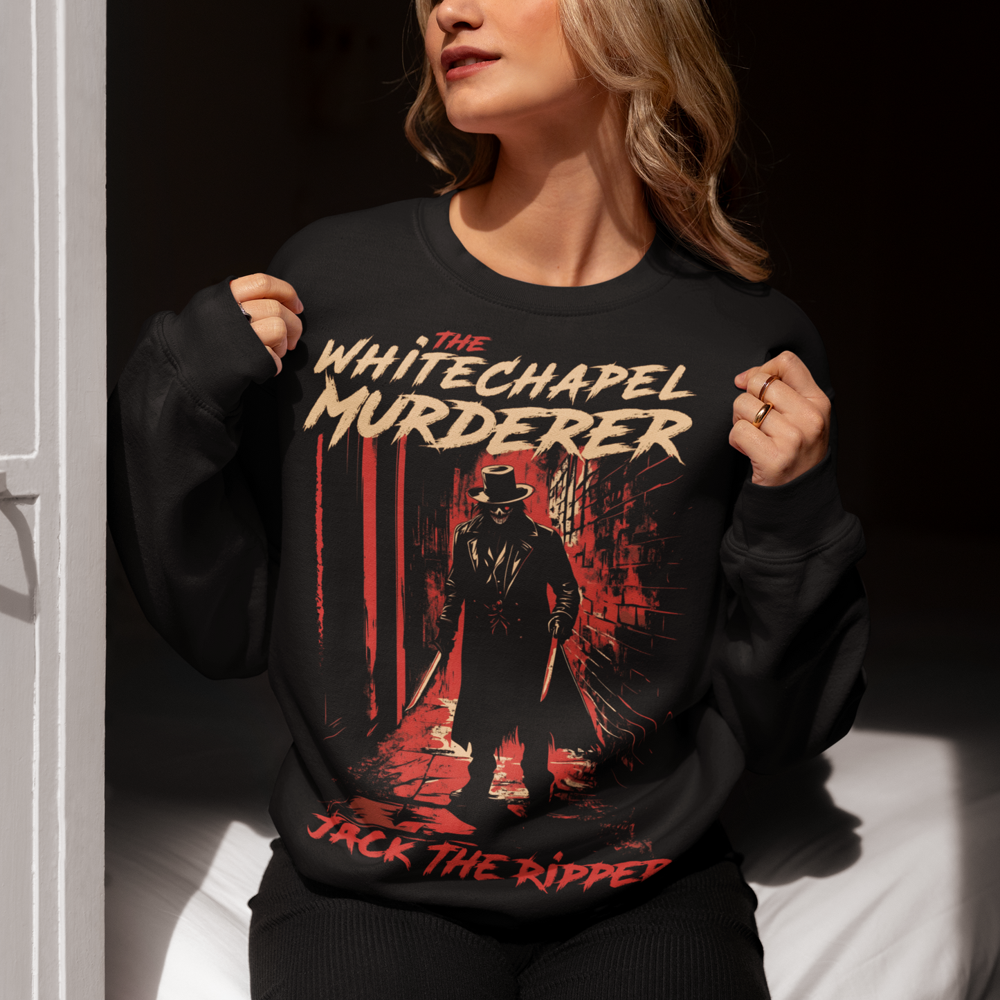 Black sweatshirt of Jack the ripper standing in an old Victorian alley with text above "THE WHITECHAPEL MURDERER" and text below "JACK THE RIPPER".