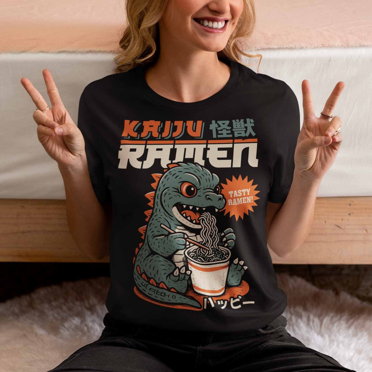 This epic tee features a towering Japanese monster (Kaiju) mid-slurp, devouring a massive bowl of ramen with wild abandon. With chopsticks in claw and noodles flying, it’s the ultimate mashup of monstrous hunger and culinary chaos. Bold text above reads KAIJU RAMEN, bringing Tokyo street-style energy to your wardrobe.
