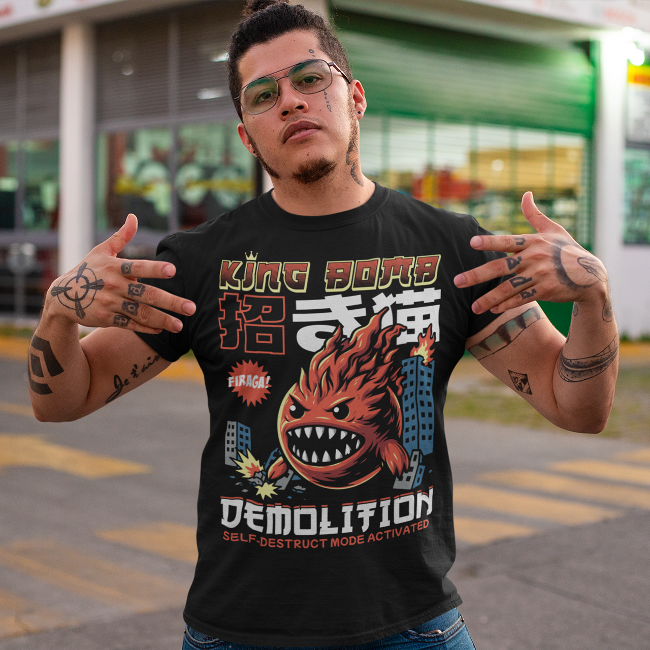 Unleash the chaos with our Japanese-style “King Bomb Demolition” T-Shirt. Featuring a larger-than-life kaiju-inspired character, King Bomb towers over a crumbling cityscape in a striking manga/anime art style. Explosive details capture the raw energy of destruction as skyscrapers topple in his wake. Bold Japanese design elements bring an authentic streetwear vibe, while the text “KING BOMB DEMOLITION” adds a gritty punch to the artwork.
