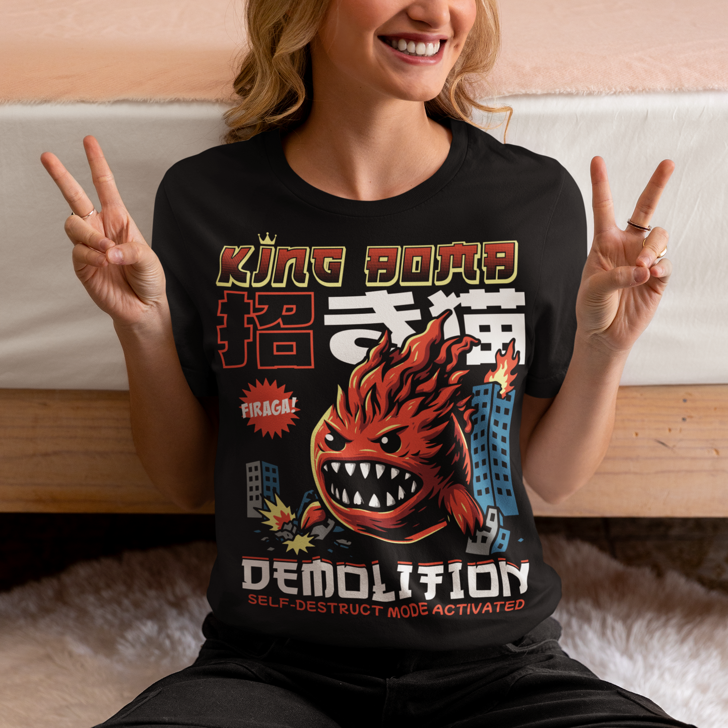 Unleash the chaos with our Japanese-style “King Bomb Demolition” T-Shirt. Featuring a larger-than-life kaiju-inspired character, King Bomb towers over a crumbling cityscape in a striking manga/anime art style. Explosive details capture the raw energy of destruction as skyscrapers topple in his wake. Bold Japanese design elements bring an authentic streetwear vibe, while the text “KING BOMB DEMOLITION” adds a gritty punch to the artwork.