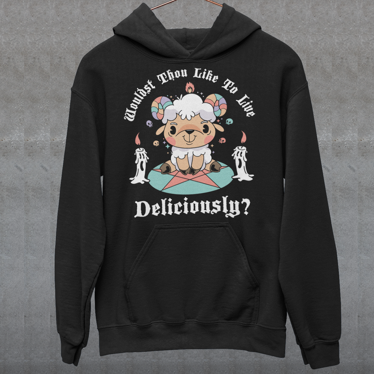 Unleash your inner rebel with this striking graphic hoodie featuring a smug, mystical goat perched atop a pentagram—summoning vibes as bold as your wardrobe. Inspired by folklore and a hint of witchy sarcasm, the chilling phrase "WOULDST THOU LIKE TO LIVE DELICIOUSLY?" is scrawled across the design in eerie, arcane lettering. Perfect for fans of the occult, dark humor, and aesthetic rebellion.