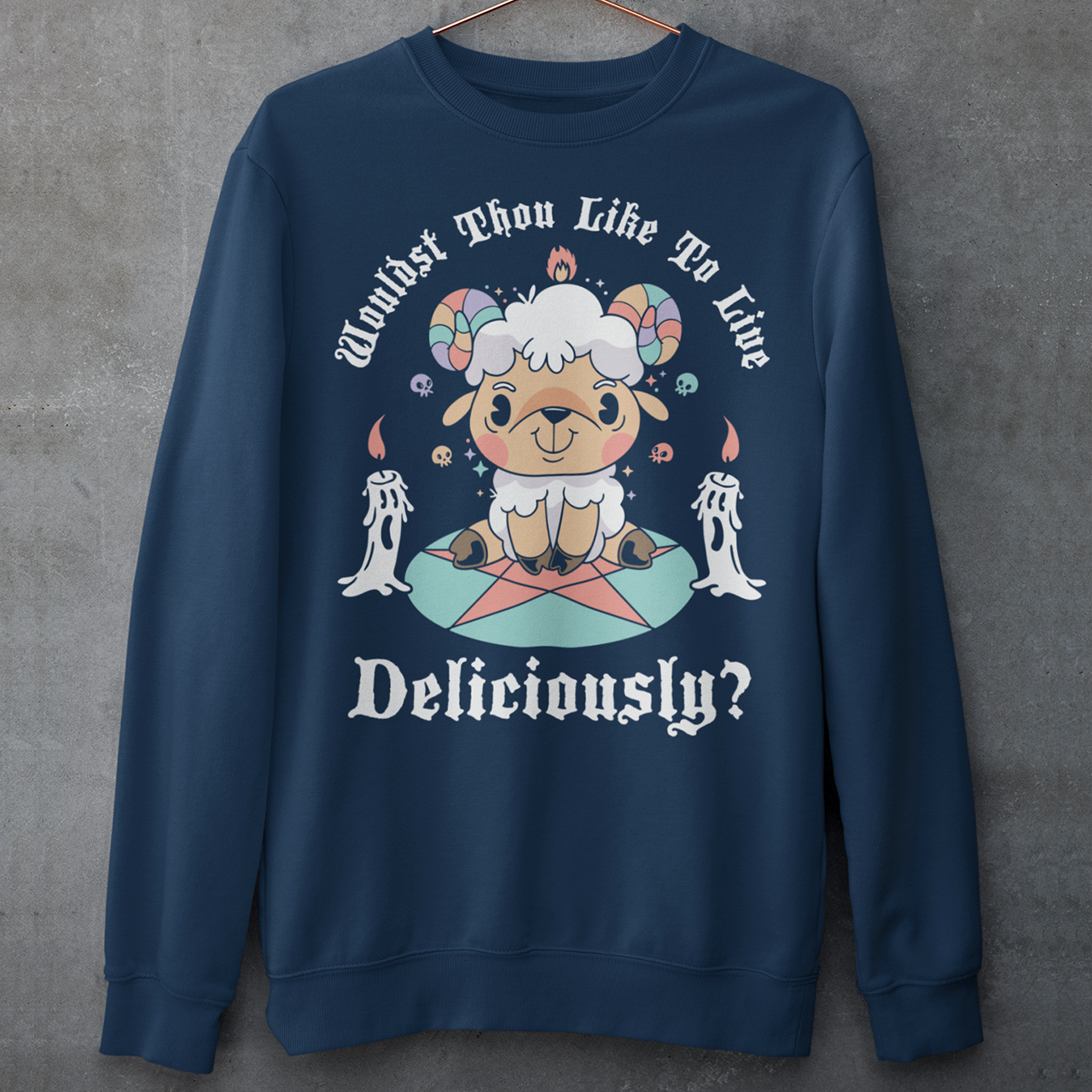 Unleash your inner rebel with this striking graphic sweatshirt featuring a smug, mystical goat perched atop a pentagram—summoning vibes as bold as your wardrobe. Inspired by folklore and a hint of witchy sarcasm, the chilling phrase "WOULDST THOU LIKE TO LIVE DELICIOUSLY?" is scrawled across the design in eerie, arcane lettering. Perfect for fans of the occult, dark humor, and aesthetic rebellion.