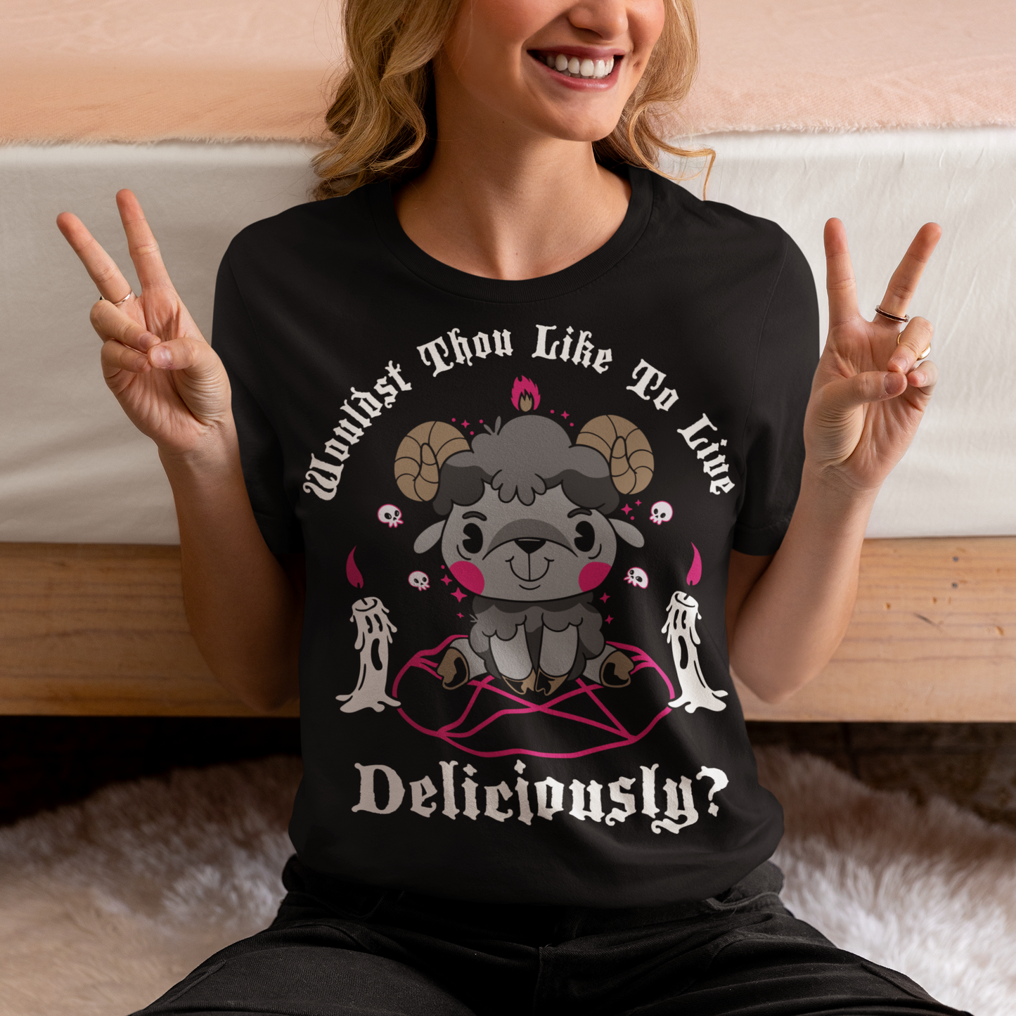 Unleash your inner rebel with this striking graphic tee featuring a smug, mystical goat perched atop a pentagram—summoning vibes as bold as your wardrobe. Inspired by folklore and a hint of witchy sarcasm, the chilling phrase "WOULDST THOU LIKE TO LIVE DELICIOUSLY?" is scrawled across the design in eerie, arcane lettering. Perfect for fans of the occult, dark humor, and aesthetic rebellion.