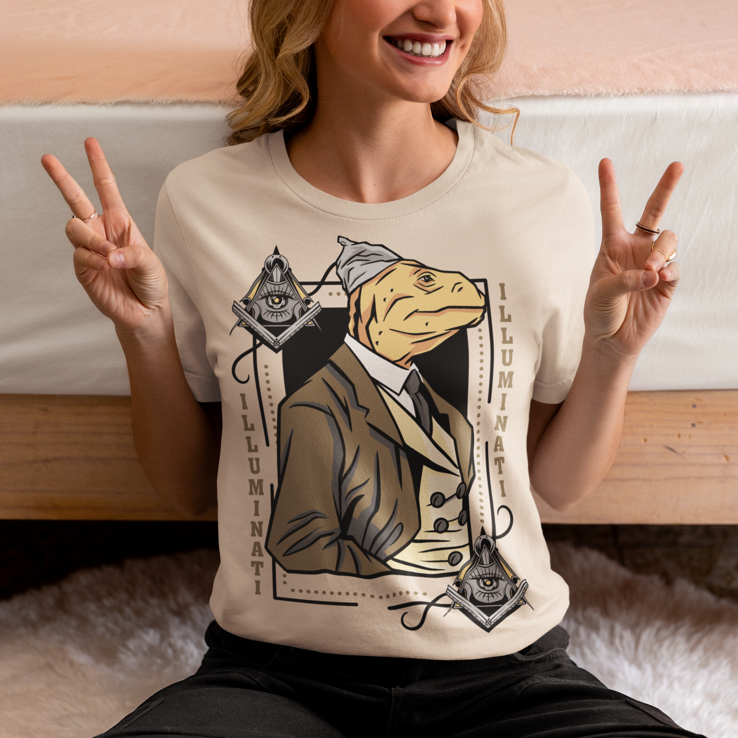 Introducing the enigmatic and captivating "Lizard Illuminati" T-shirt, a bold and eccentric garment that seamlessly blends conspiracy theories with reptilian sophistication. This one-of-a-kind tee is not just a piece of clothing; it's a statement, a conversation starter, and a whimsical nod to the mysteries that lurk in the shadows.